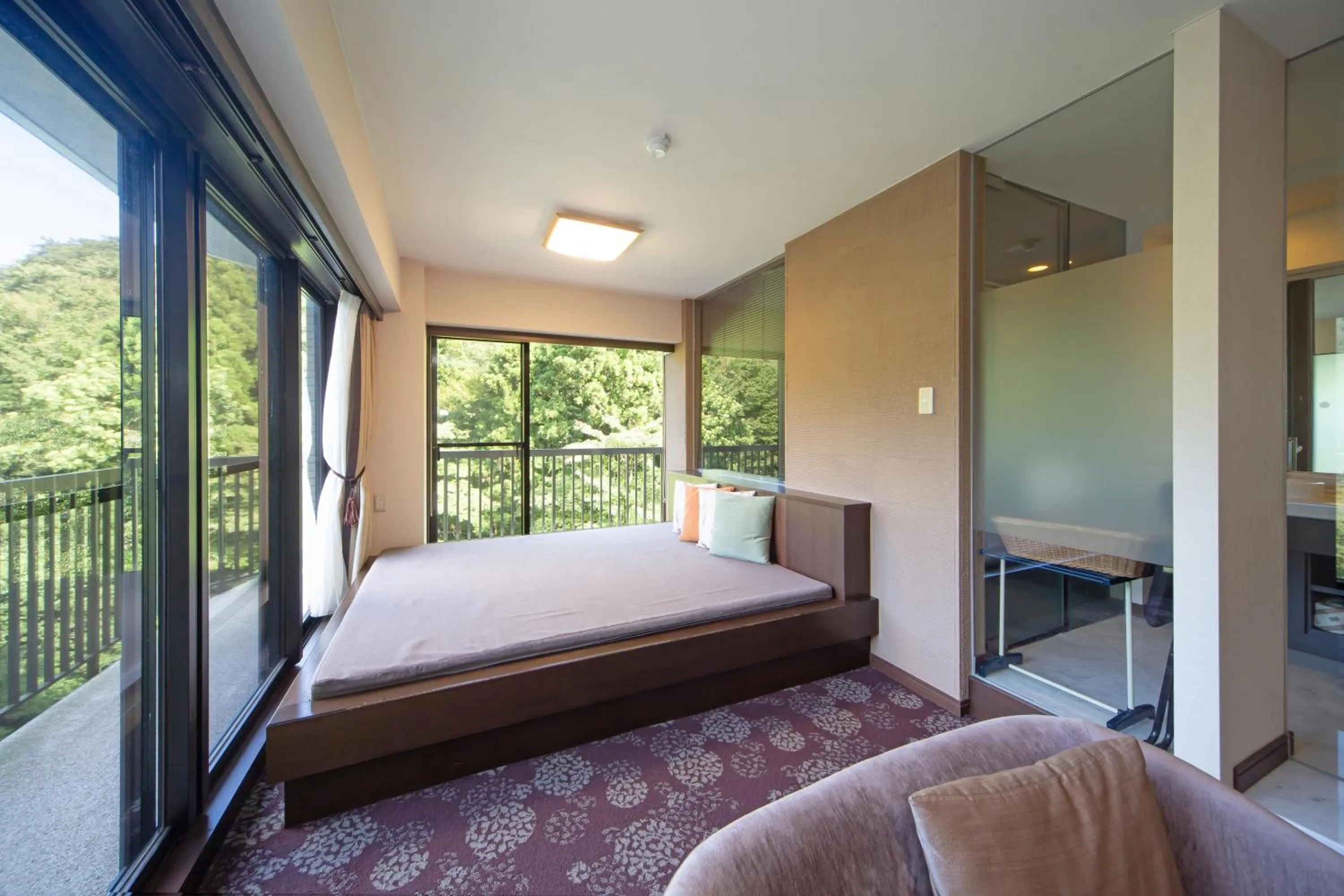 Bedroom, Bed in Art & Music Spa Resort Manatei Hakone