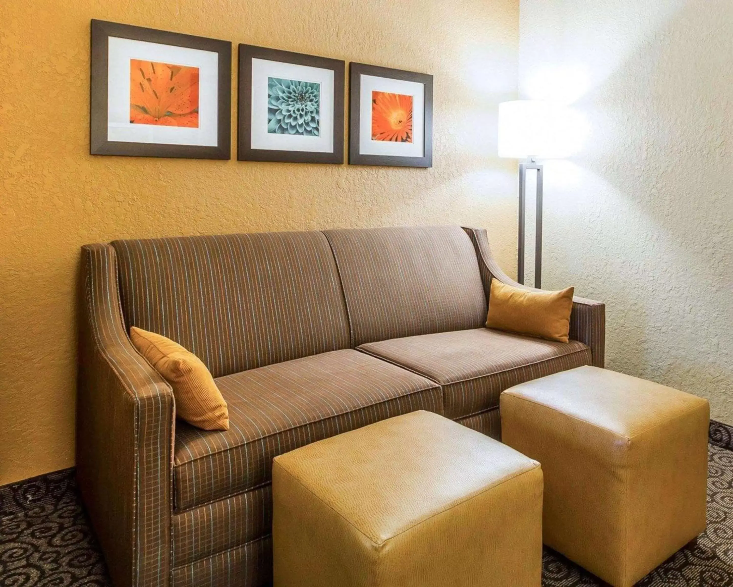 Bedroom, Seating Area in Comfort Suites