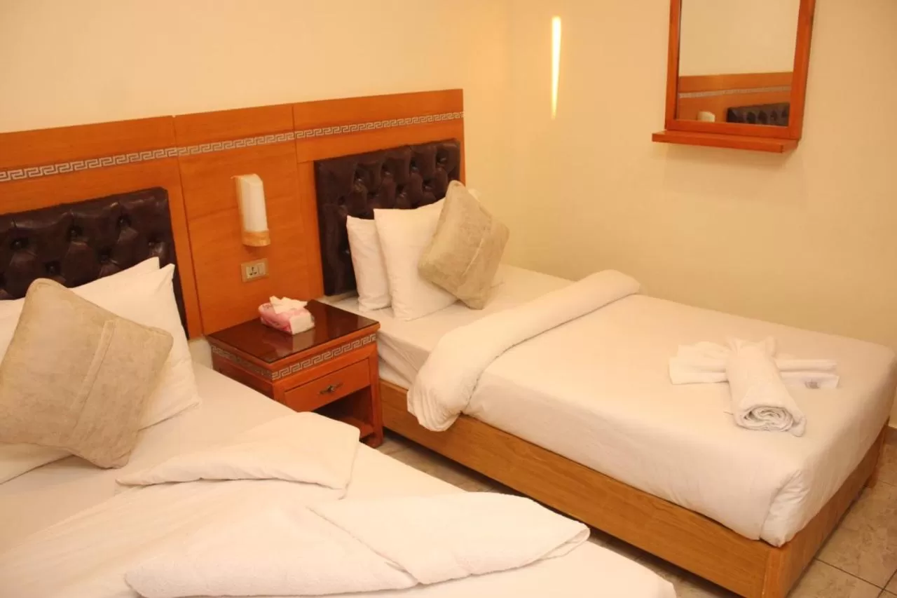 Bed in Jawharet Alswefiah Hotel Suites