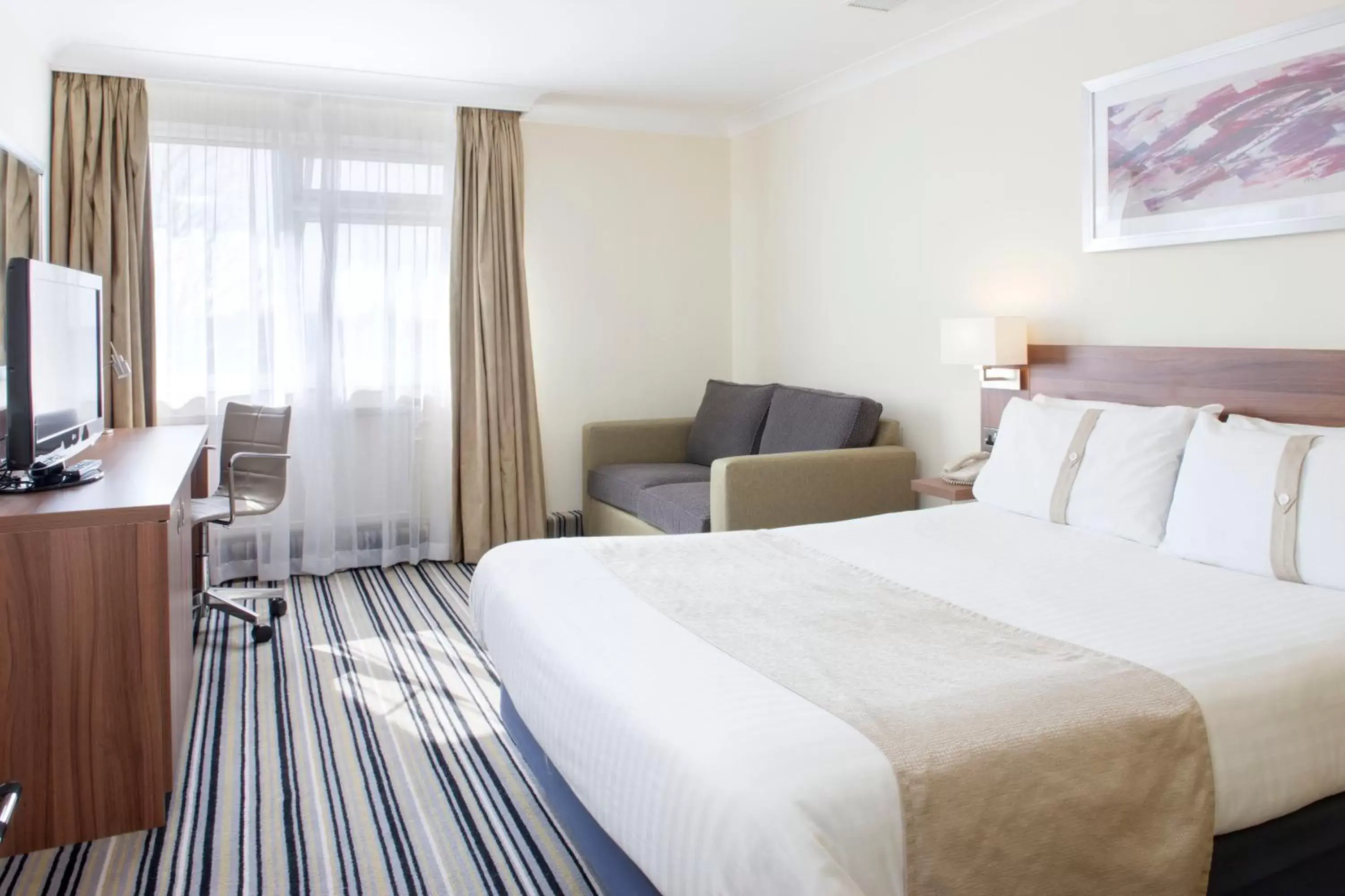 Bed in Holiday Inn Haydock, an IHG Hotel