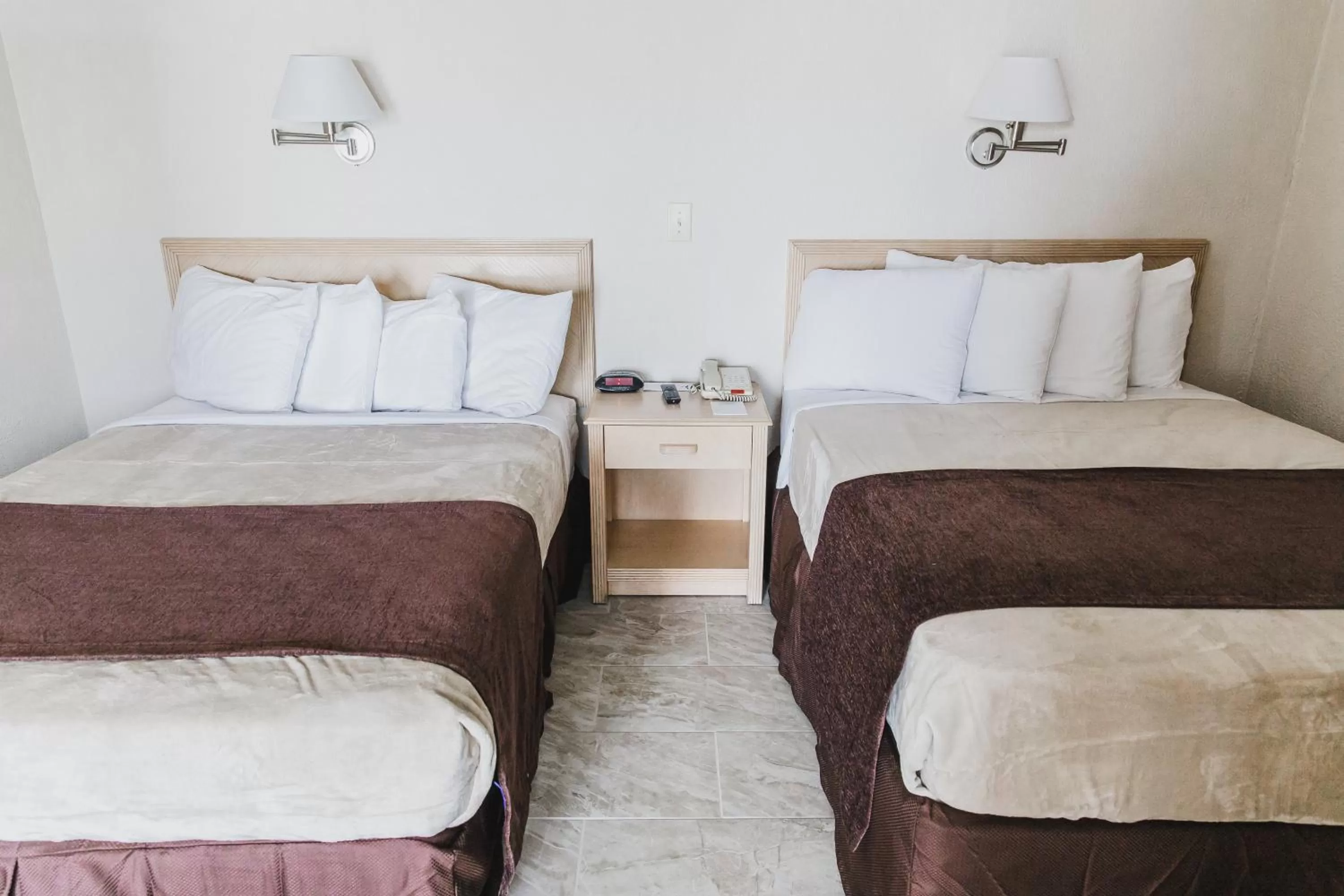 Bed in Heart of Wildwood Boardwalk Motel