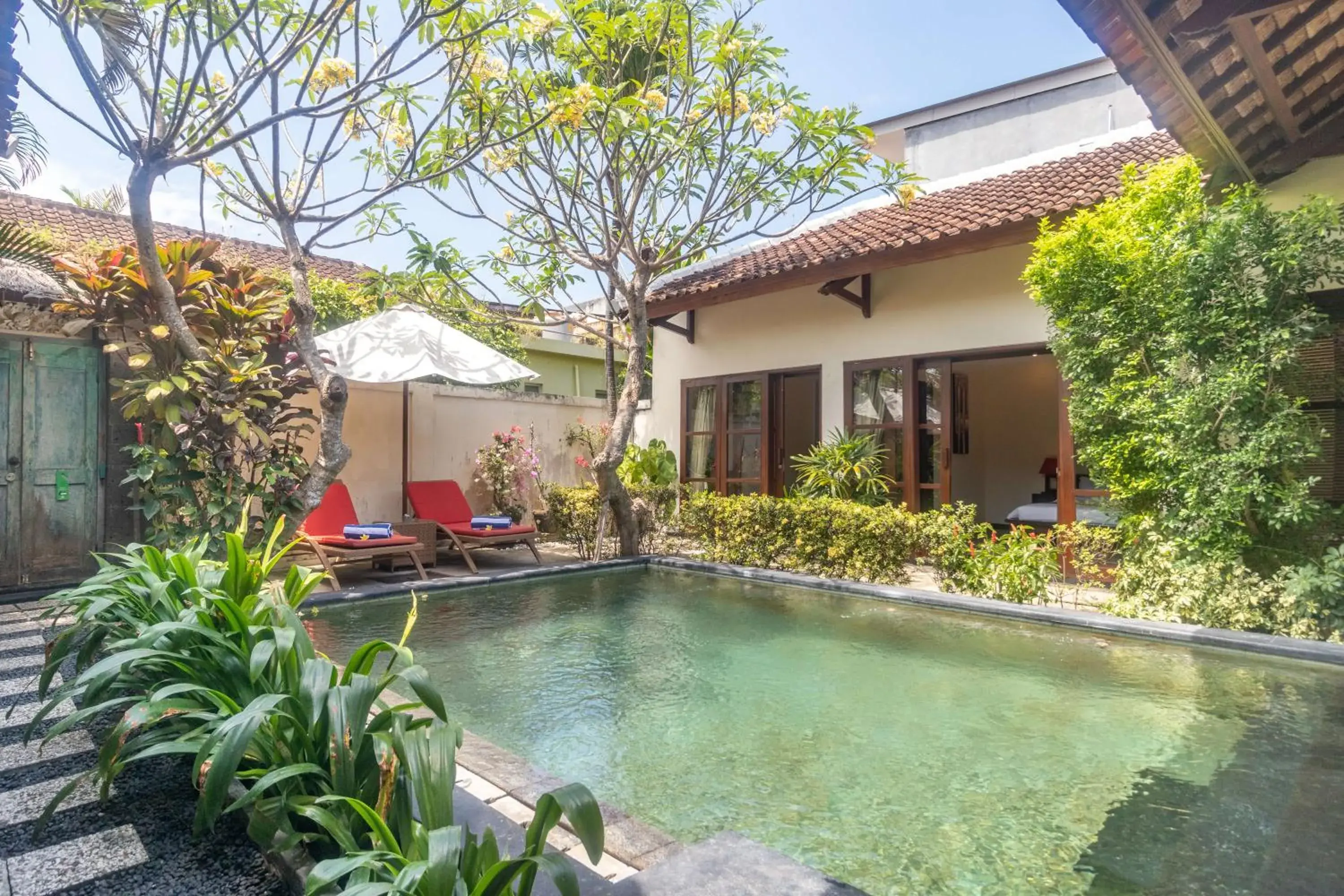 Swimming Pool in Aleesha Villas and Suites