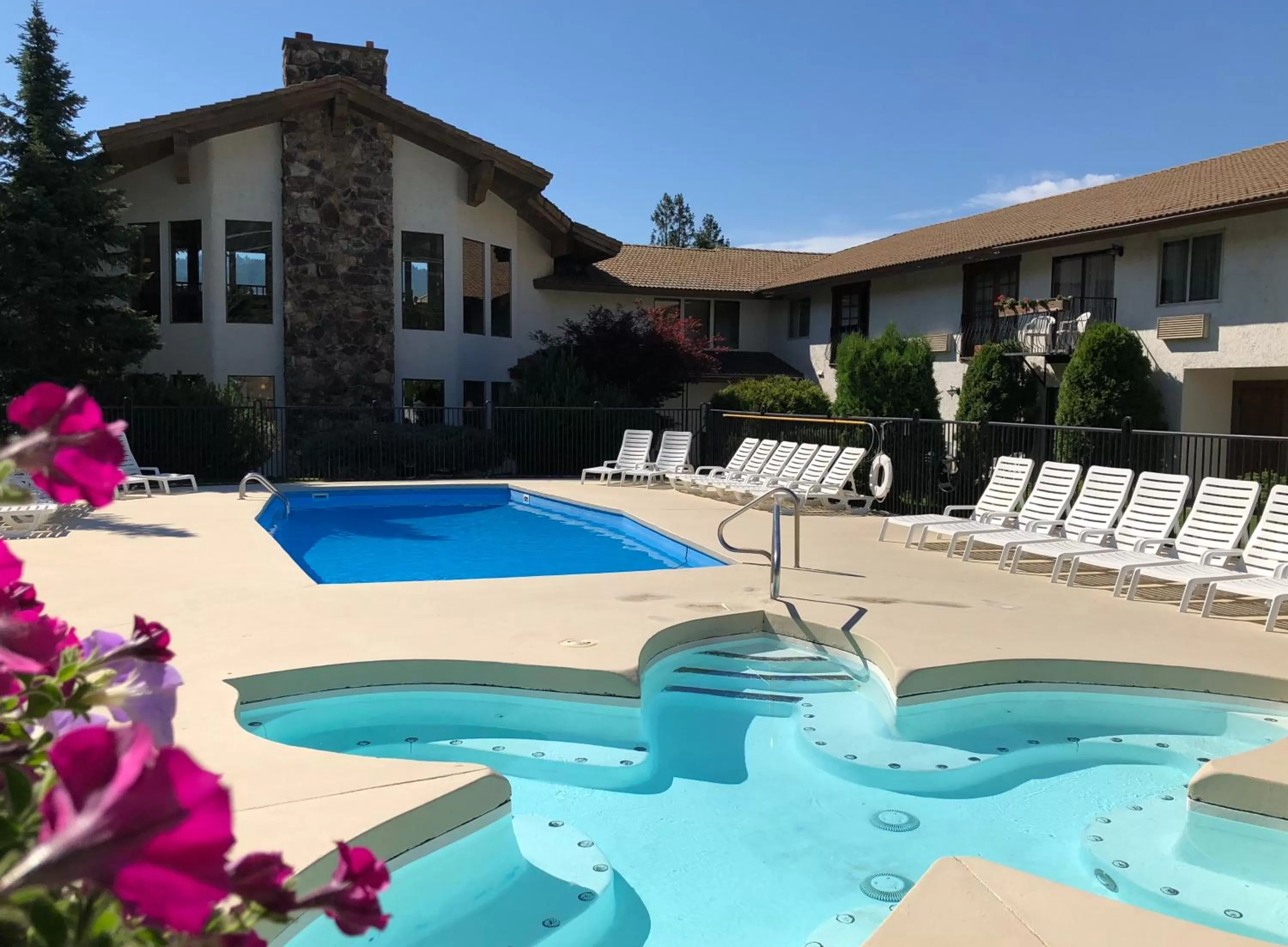 Pool view, Property Building in Enzian Inn