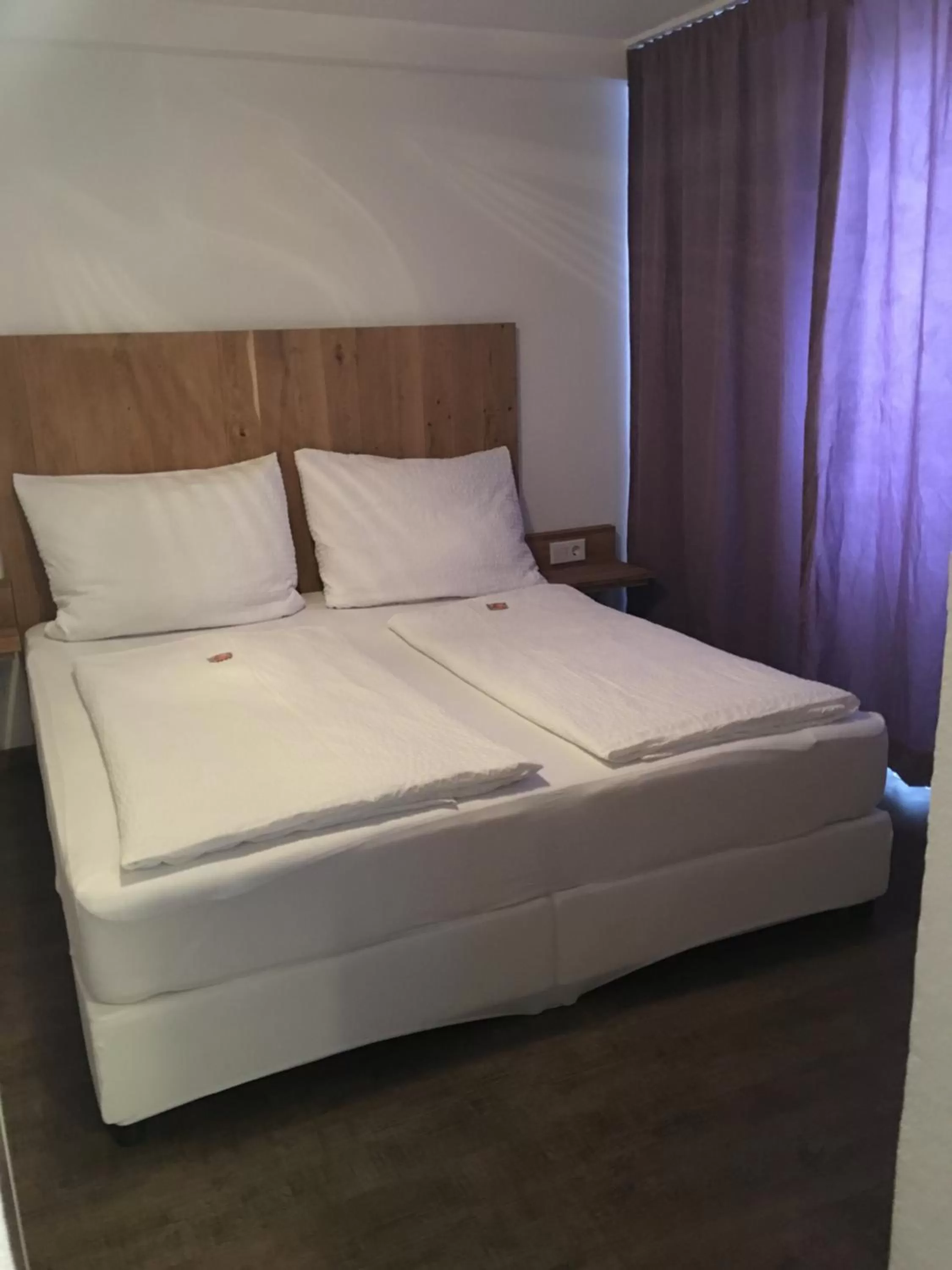 Bed in Smart Stay Rooms Feldkirch