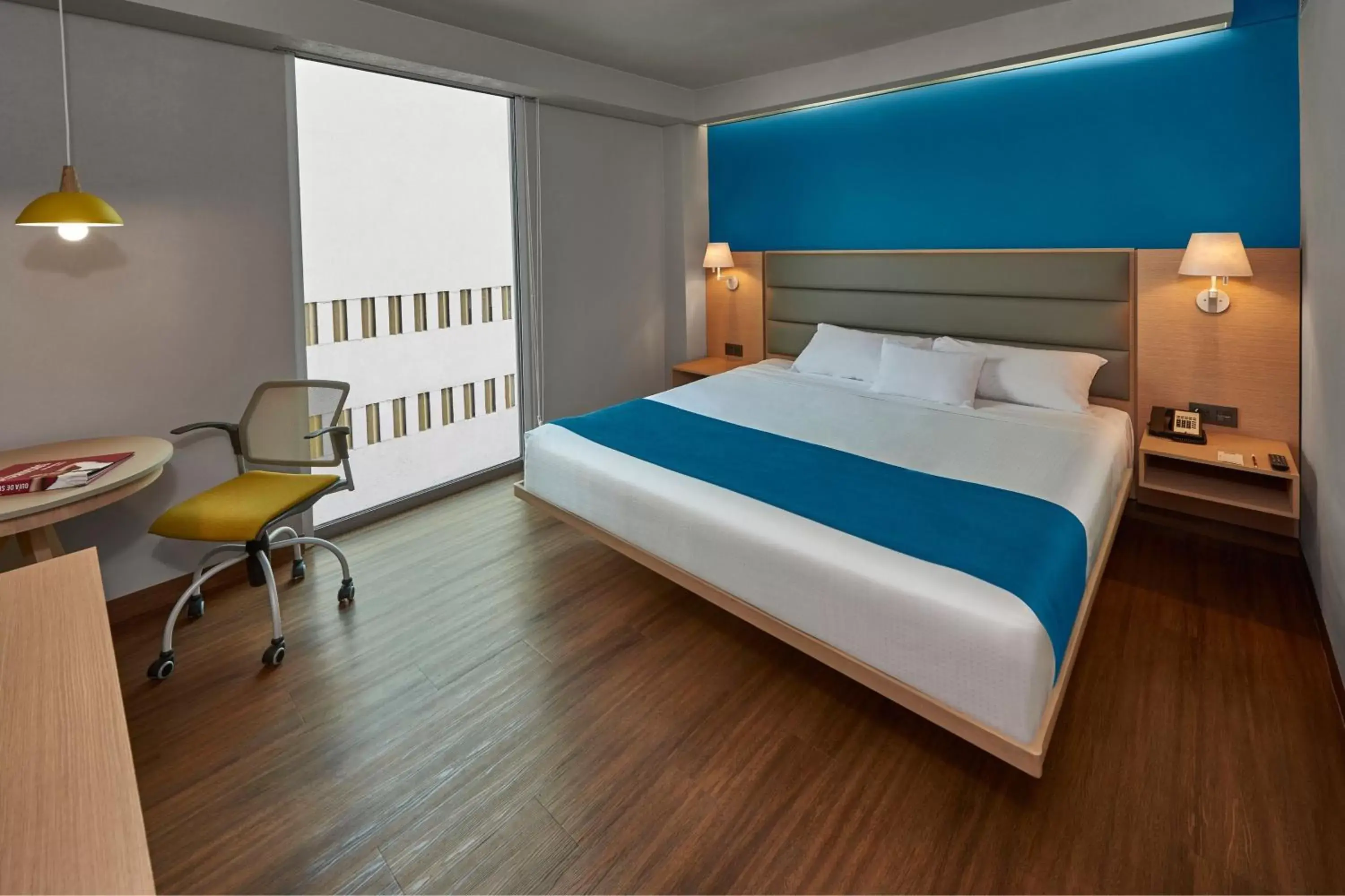 Photo of the whole room in City Express Suites by Marriott Anzures