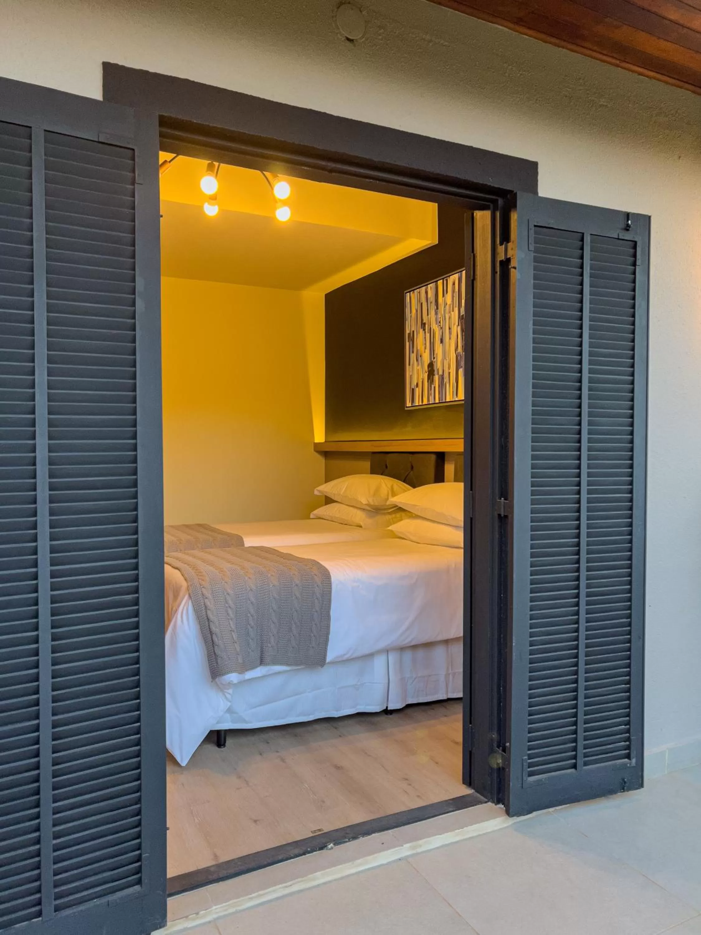 Bed in Pousada Terrazzo Bonjardim - by Easy Hotéis