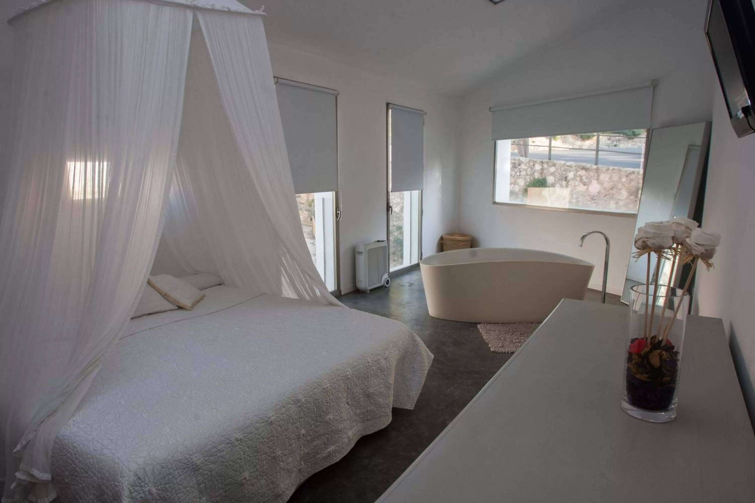 Bed in La Maga Rooms