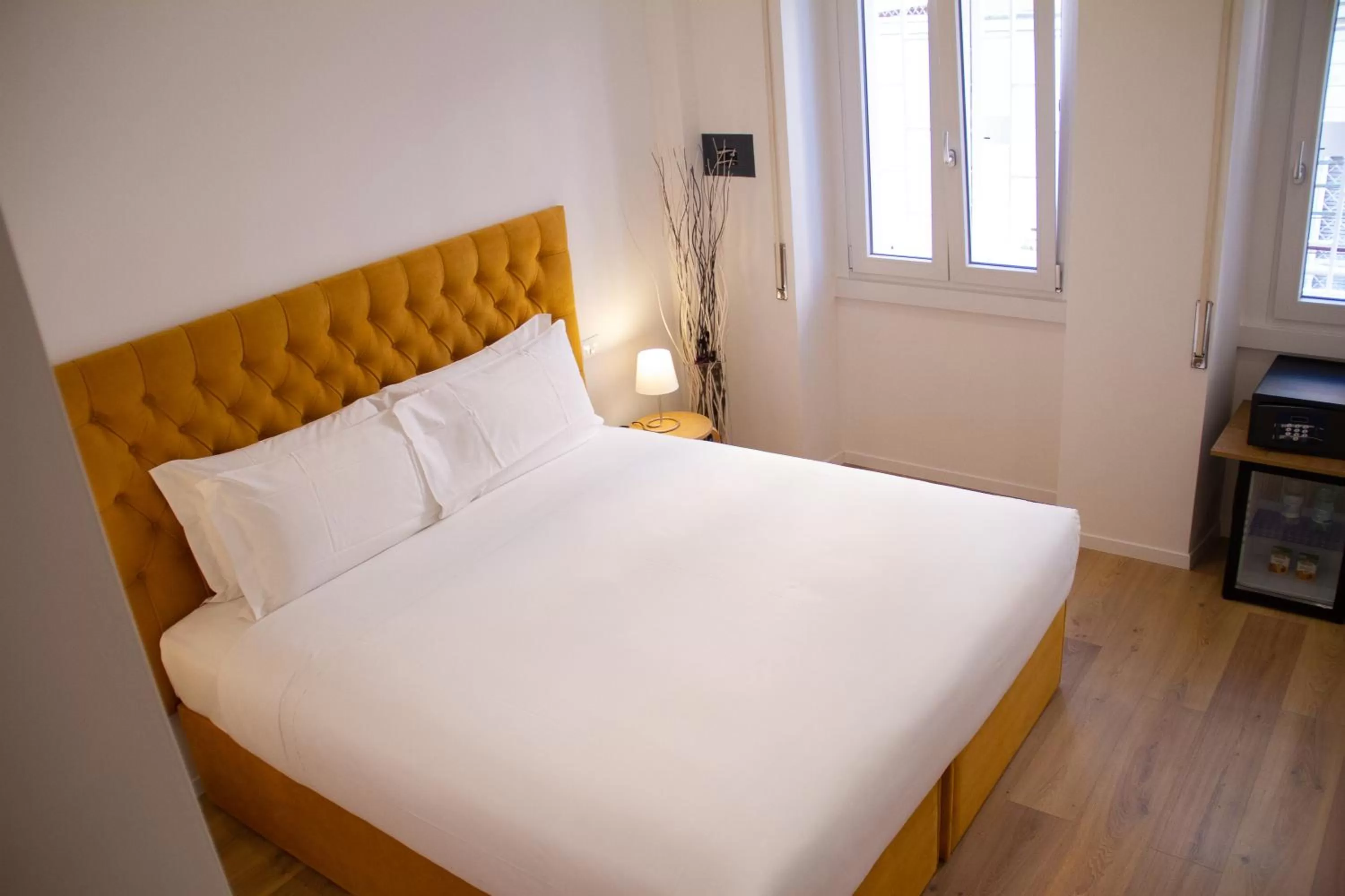 Bed in Michelangelo Vatican Rooms