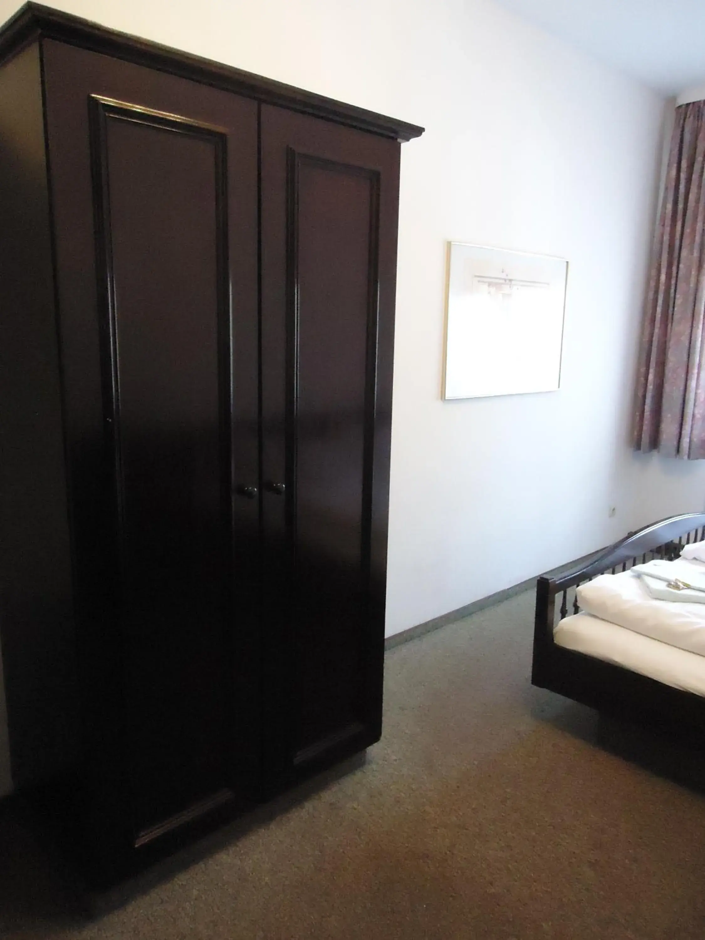 Bedroom, TV/Entertainment Center in Hotel Marthahaus