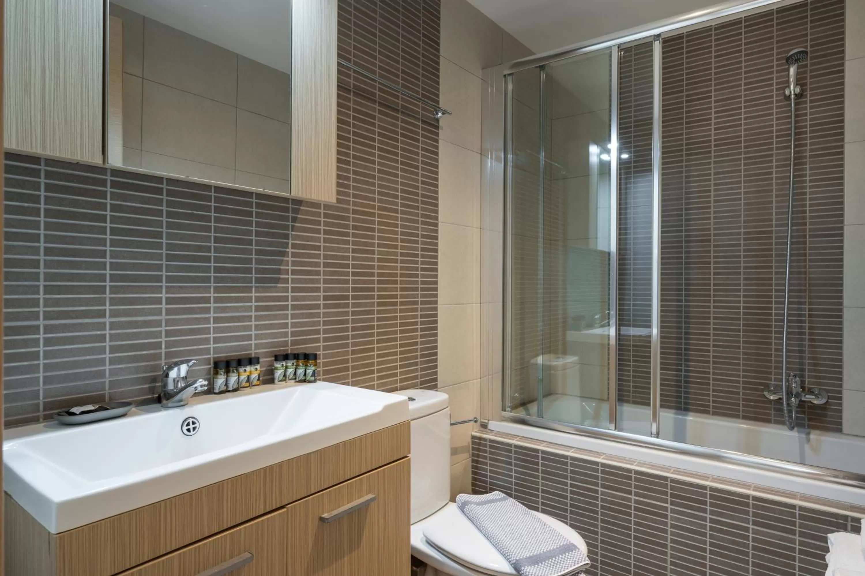 Bathroom in Trianon Luxury Apartments & Suites