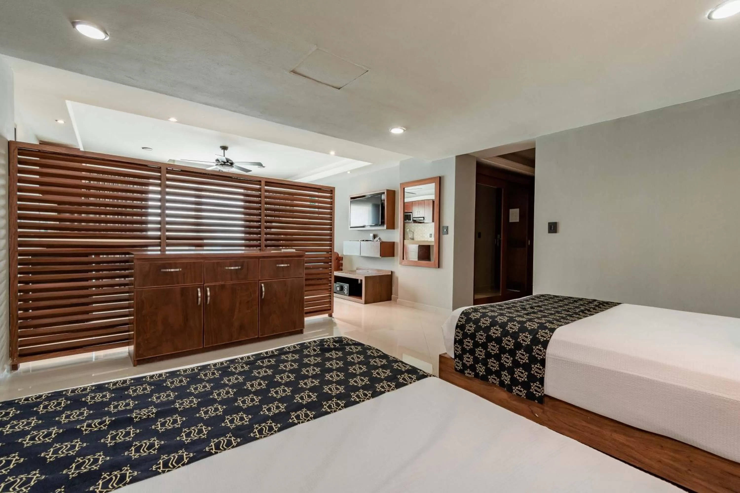 Bed in Ocean Dream Cancun by GuruHotel