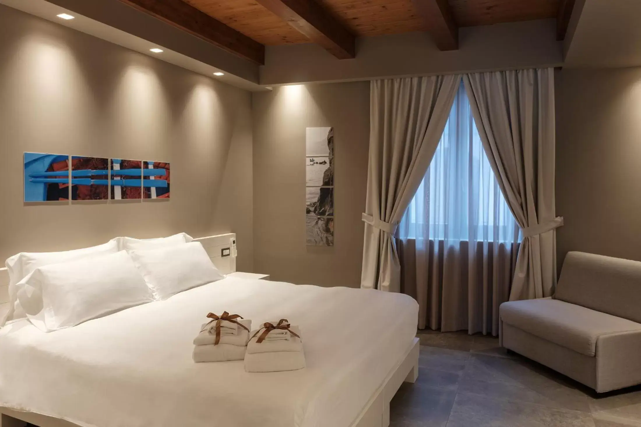 Bed in Il Casato Deluxe Rooms