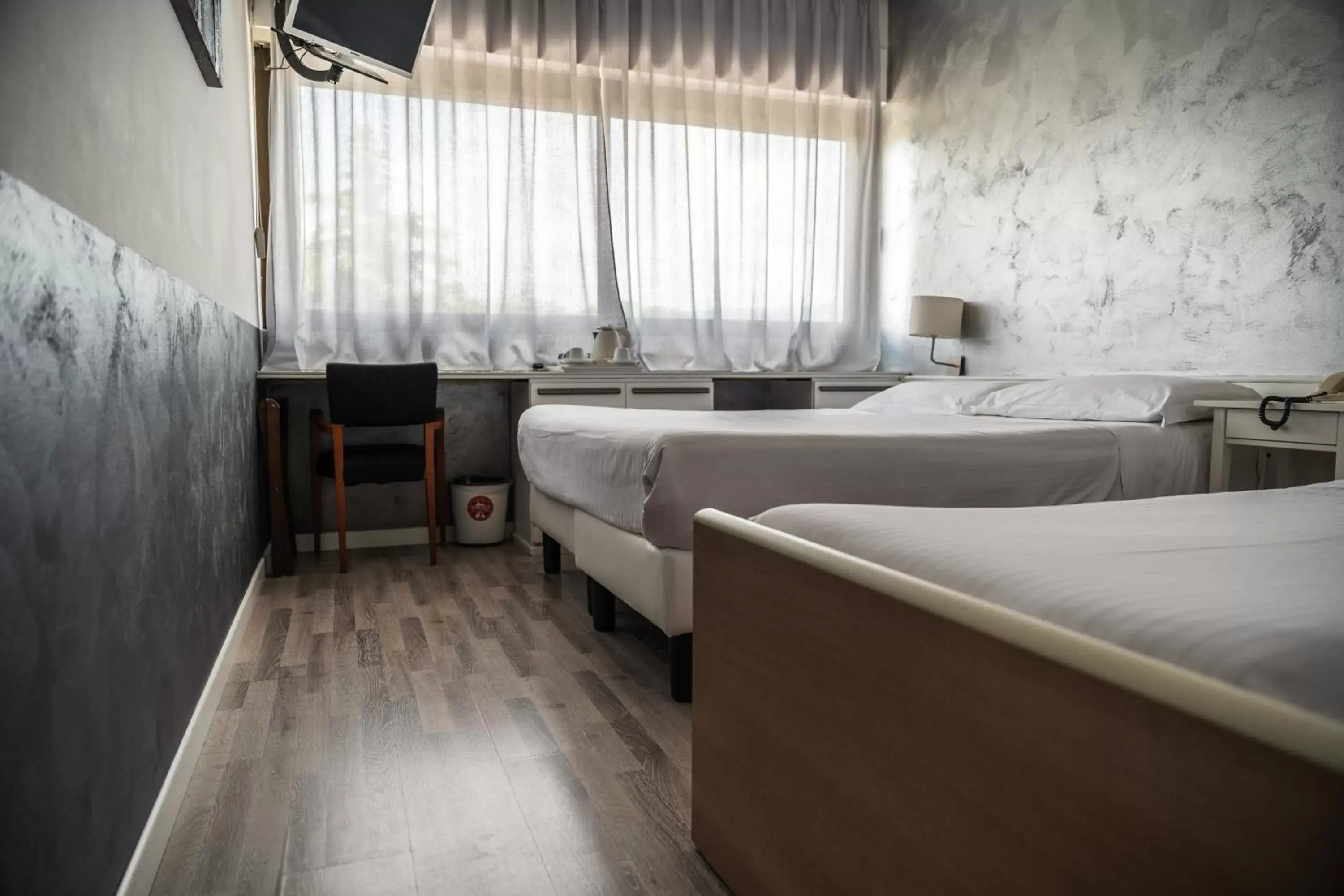 Bed in Hotel Valpolicella International