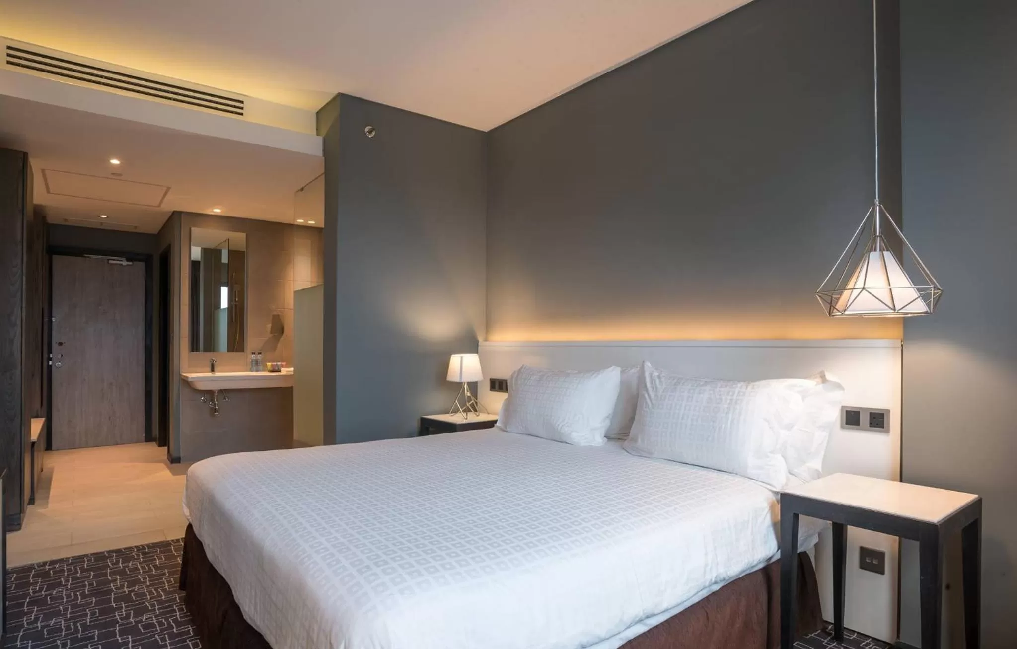 Bed in Trademark Hotel, a Member of Design Hotels