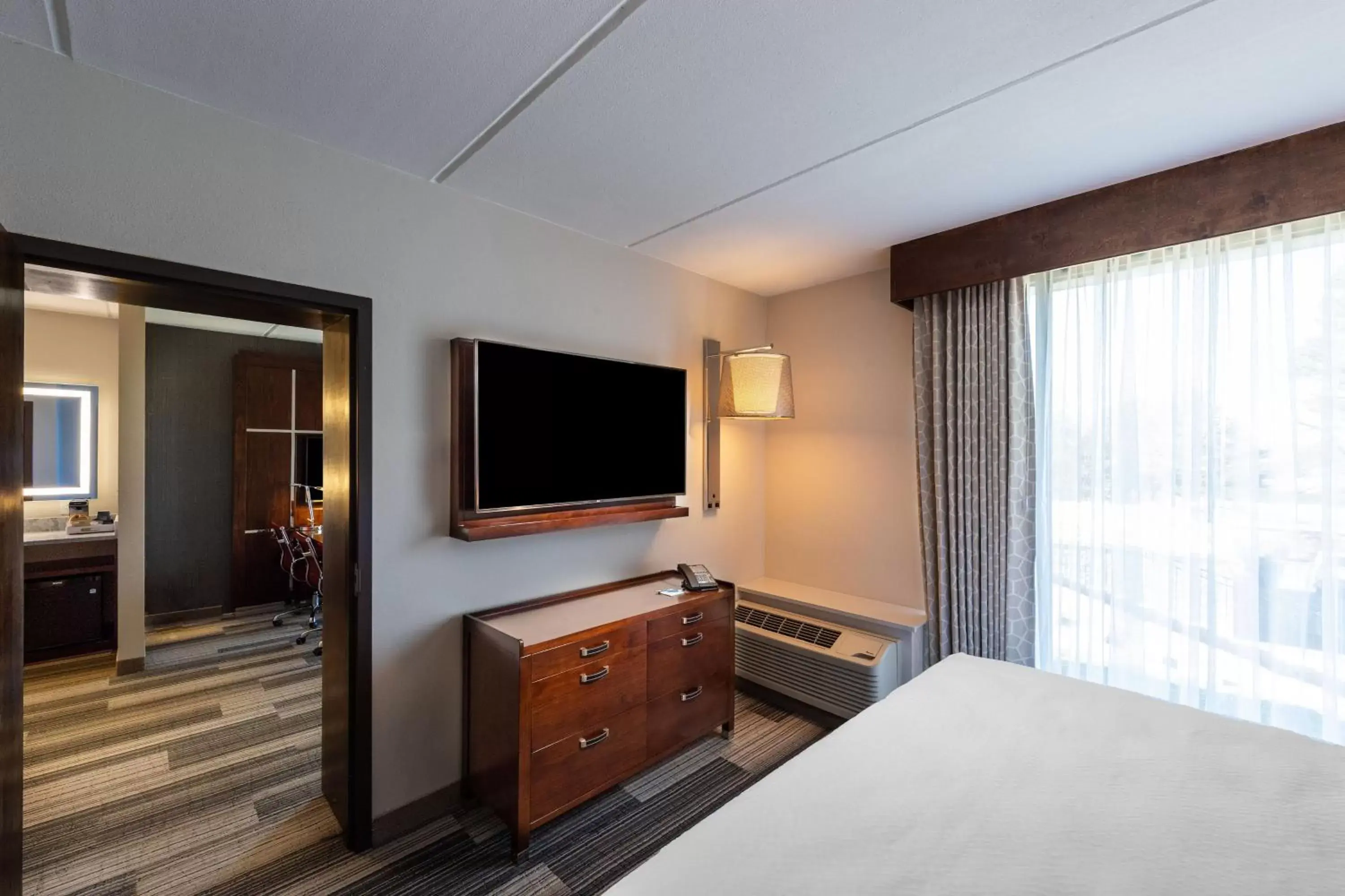 Photo of the whole room, TV/Entertainment Center in Four Points by Sheraton Atlanta Airport West