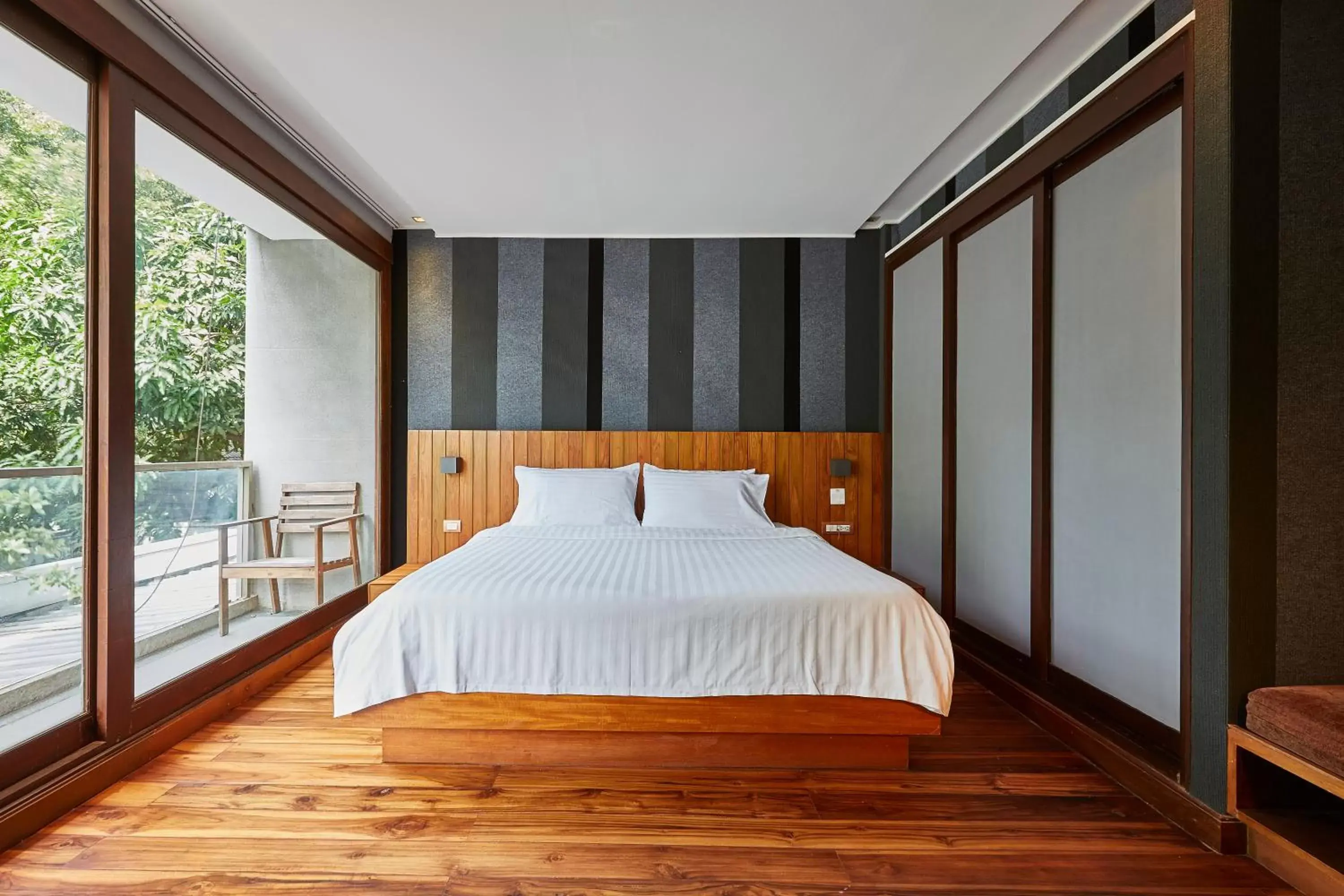 Bed in LUXX Langsuan Hotel - SHA Plus