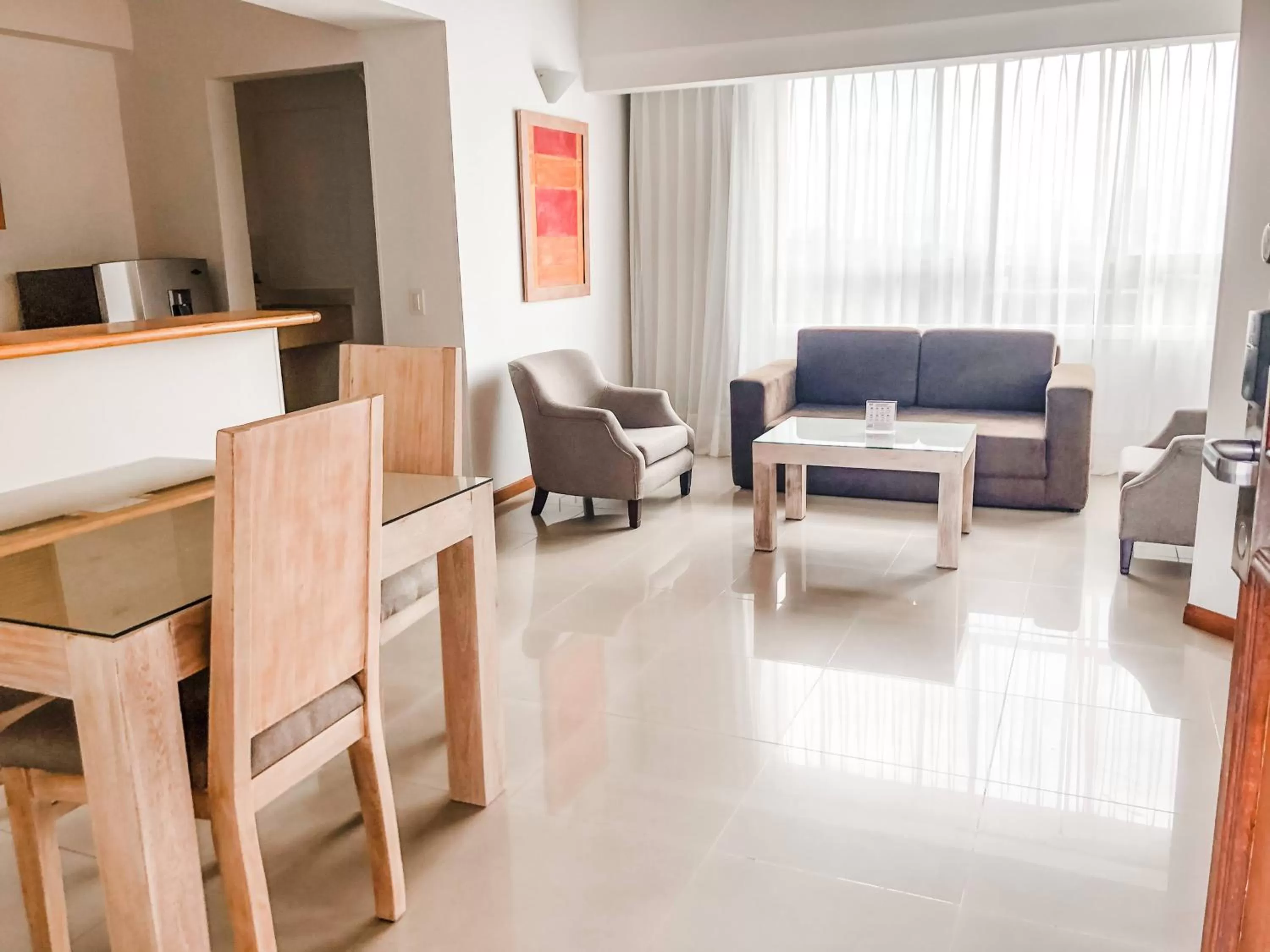 Living room in Portal del Rodeo ApartaHotel - Arkadia Mall