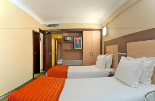 Bed in Lamartine Hotel