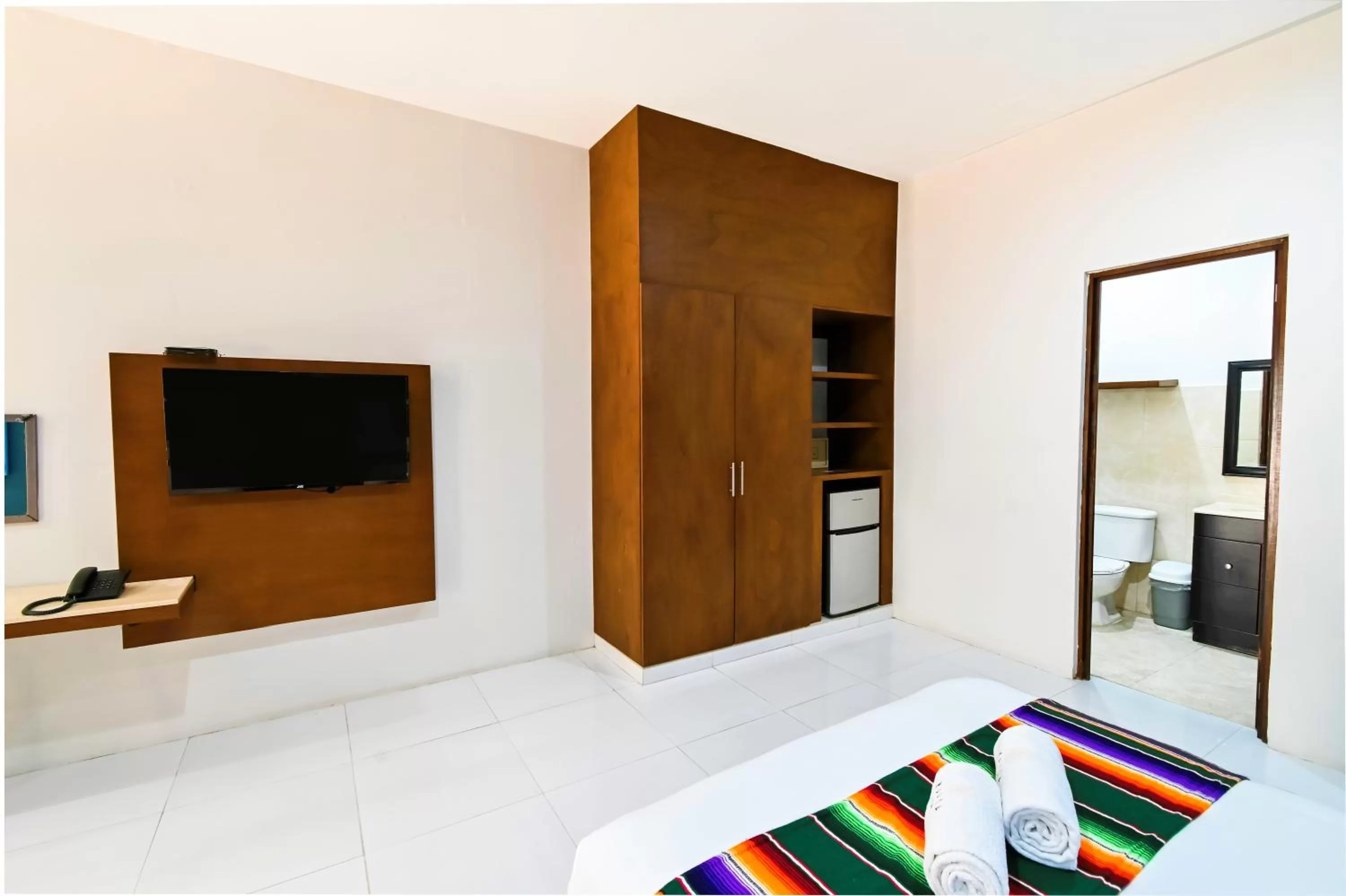 Photo of the whole room, Bed in Hotel Mariachi by Kavia 5th Av