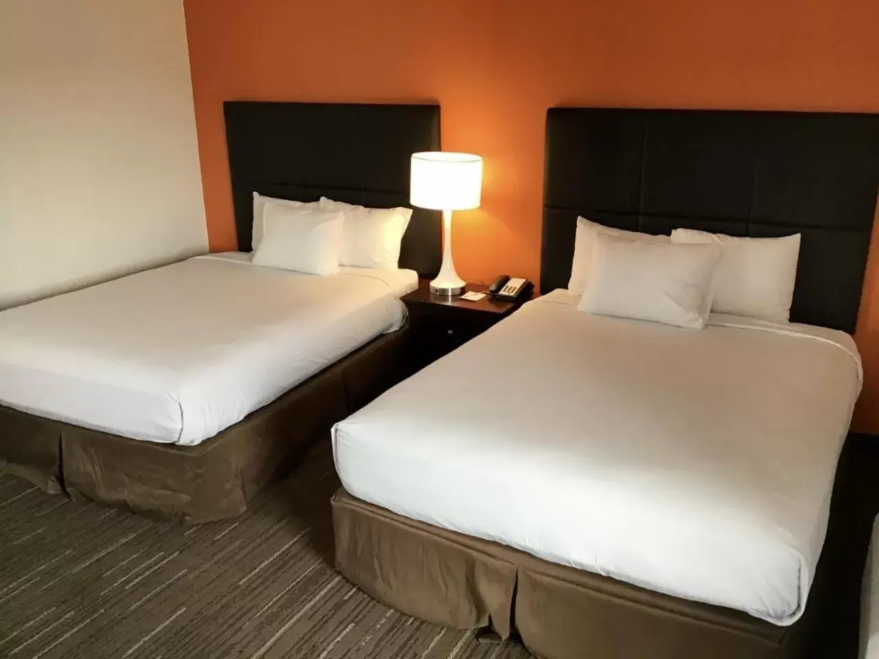 Bed in Howard Johnson by Wyndham Spokane