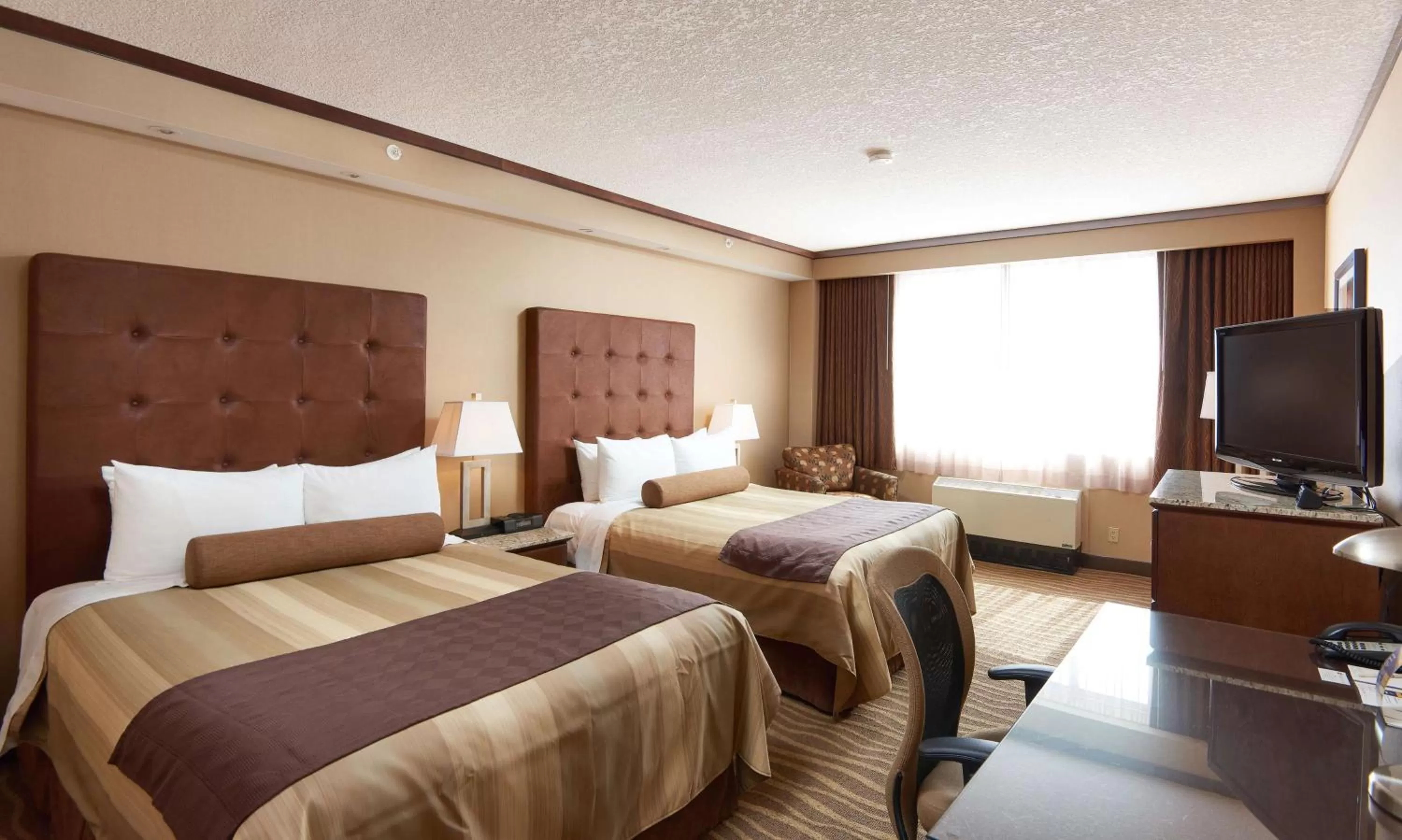 Queen Room with Two Queen Beds and Mobility Accessible Tub - Non-Smoking in Best Western Premier Denham Inn & Suites