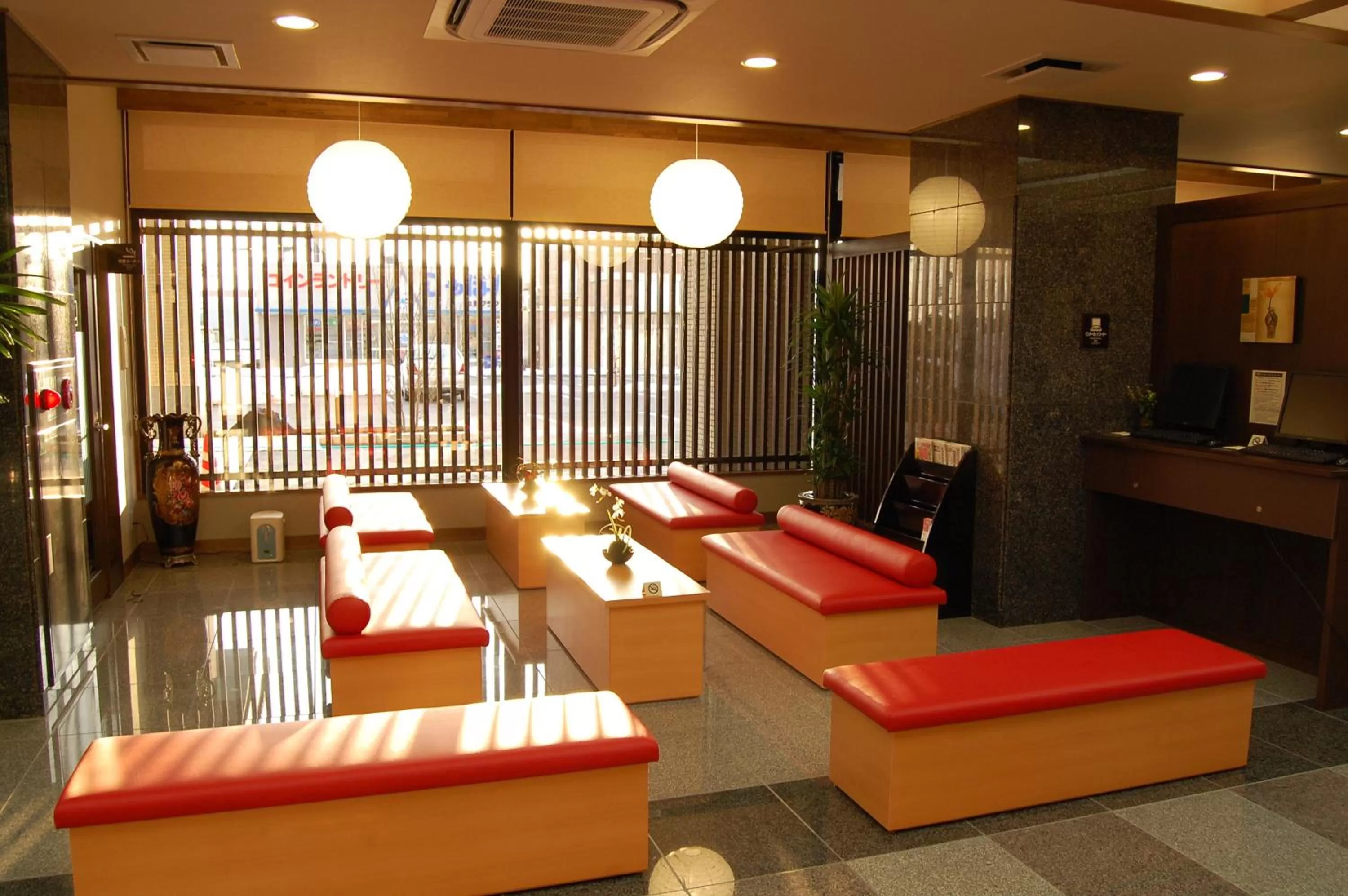 Seating area in Route Inn Grantia Himi Wakuranoyado