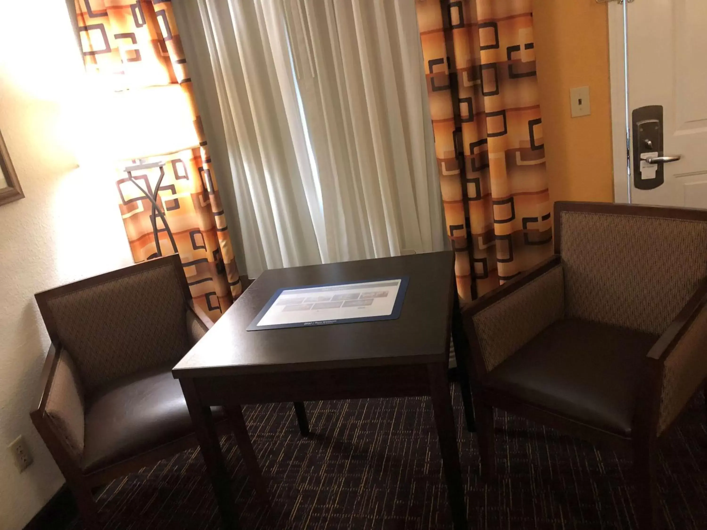 Photo of the whole room, Seating Area in Best Western Executive Inn