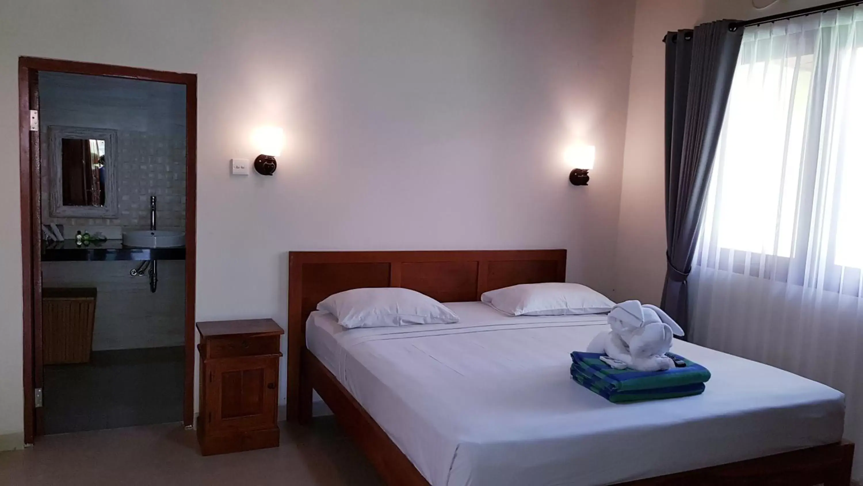 Bedroom, Bed in Kusnadi Hotel