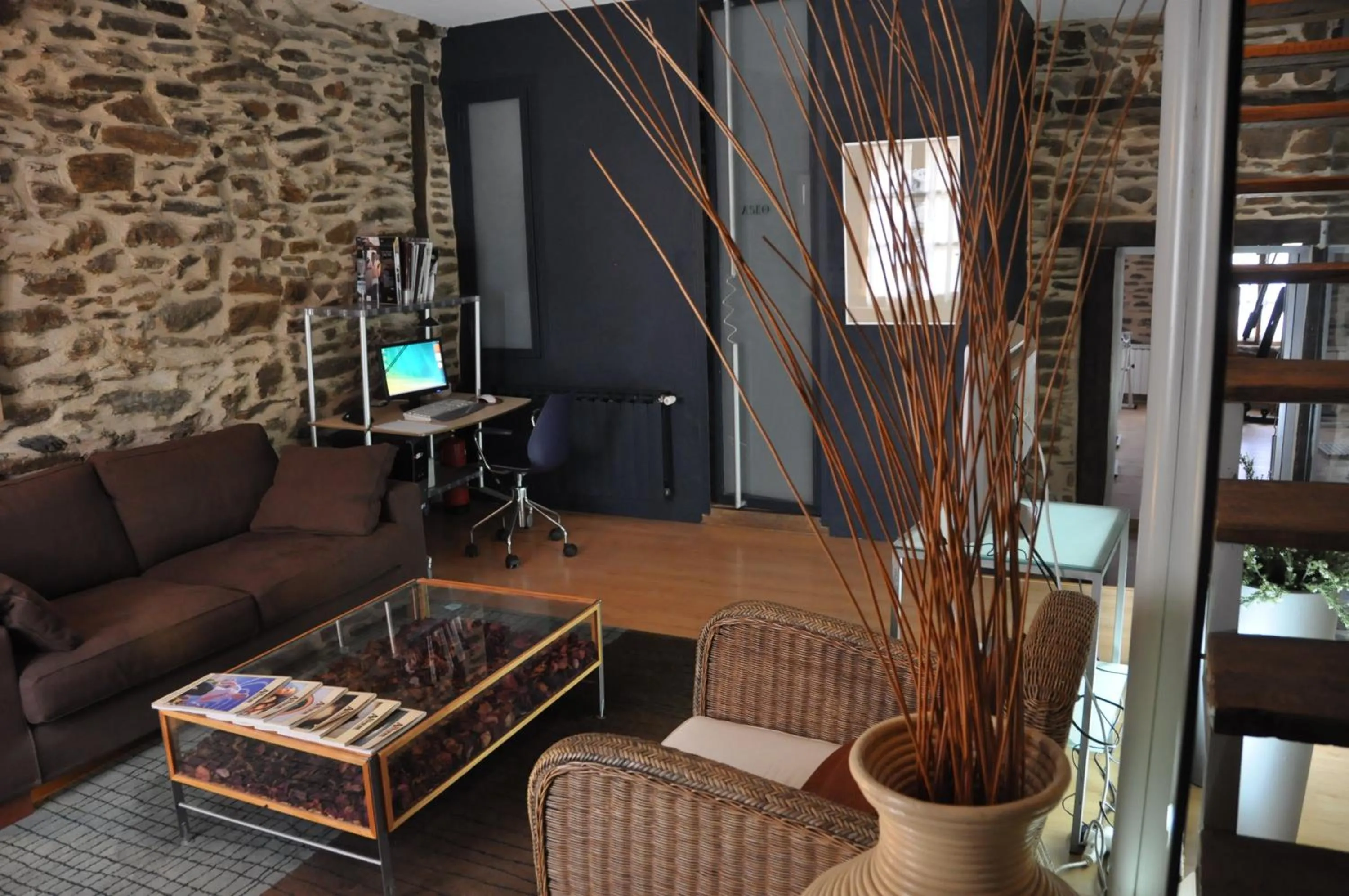 Communal lounge/ TV room in Posada Real La Carteria