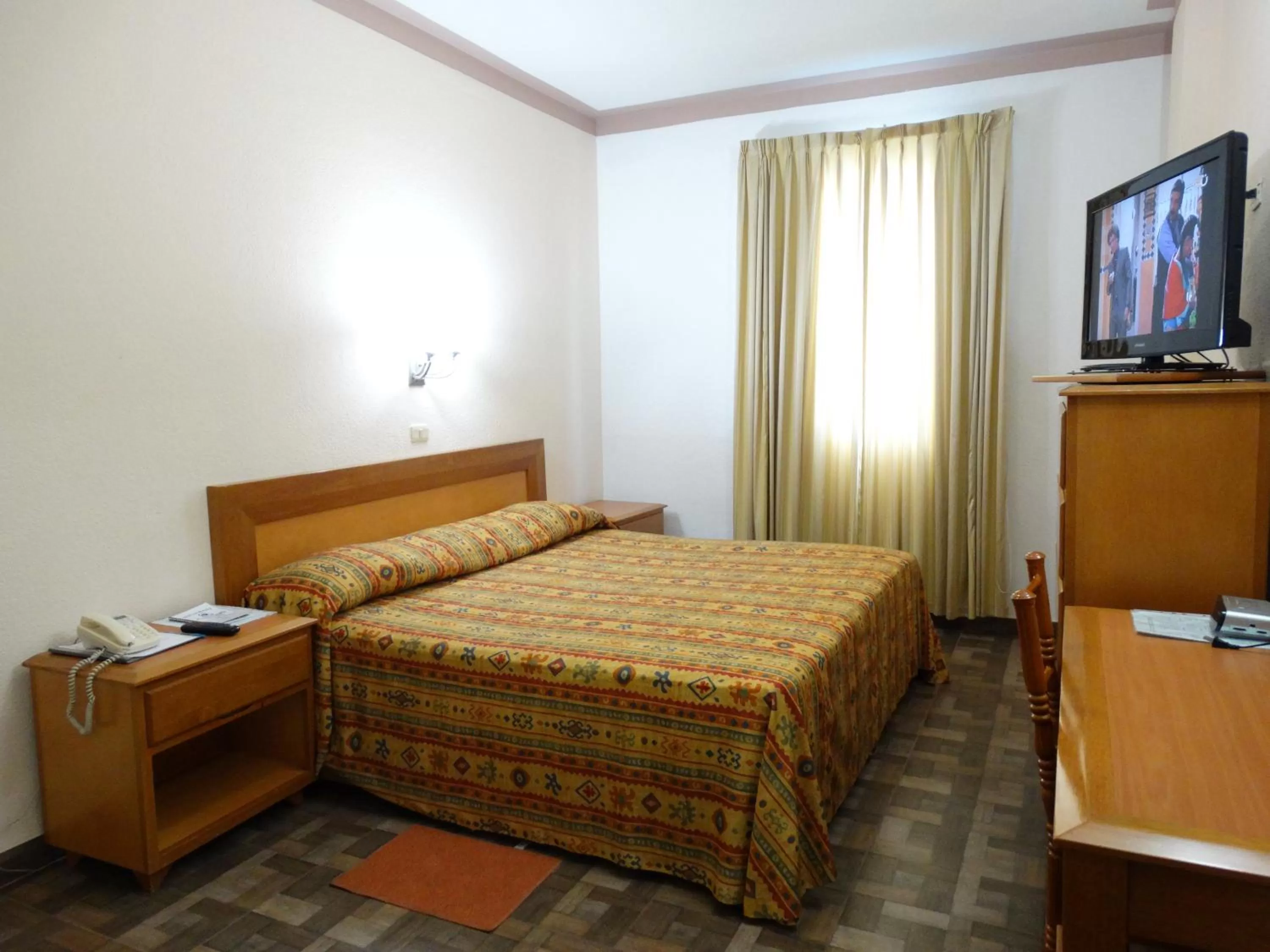 Bed in Hotel Astromundo