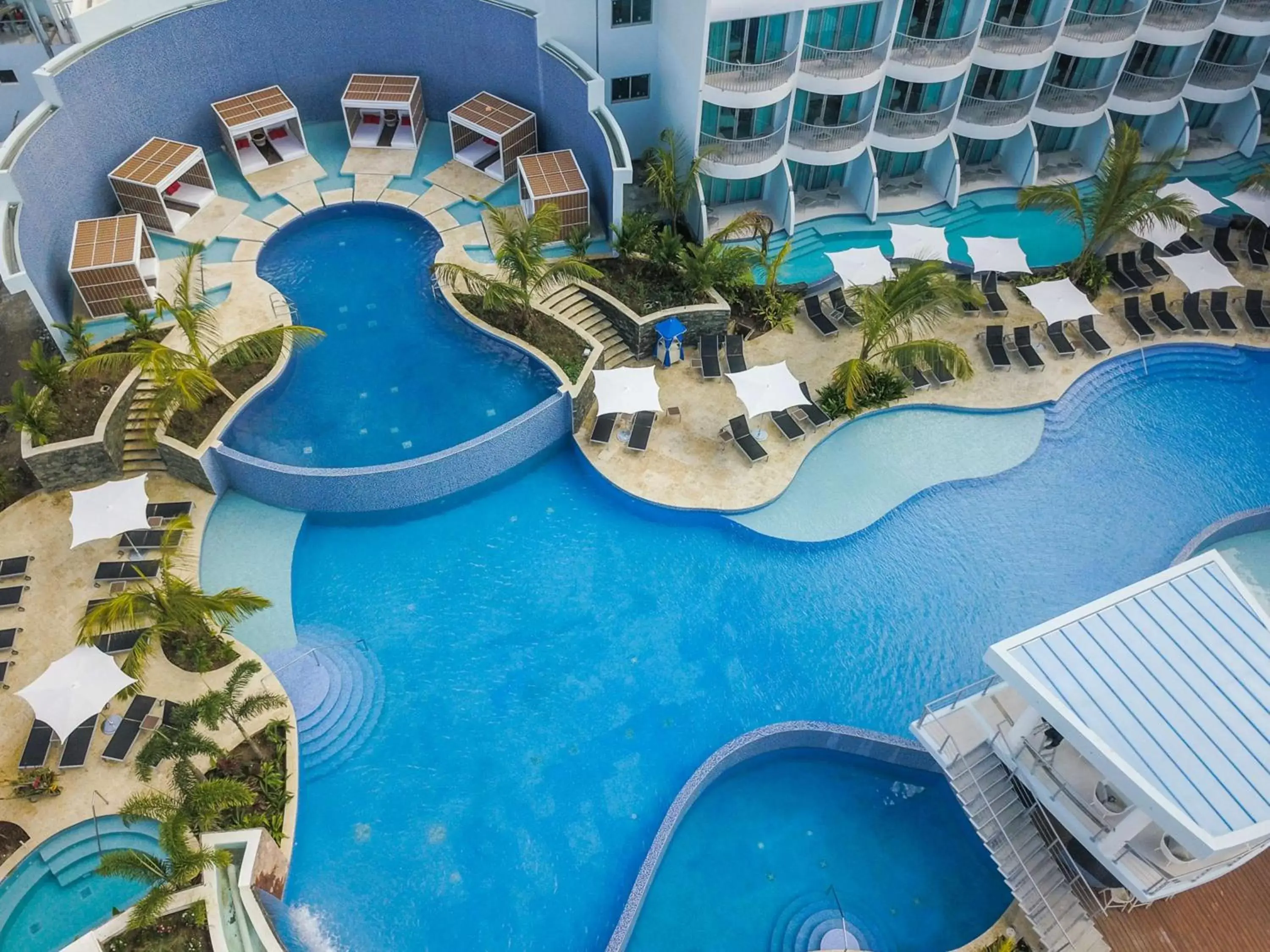 Swimming pool, Pool View in Harbor Club St Lucia, Curio Collection by Hilton