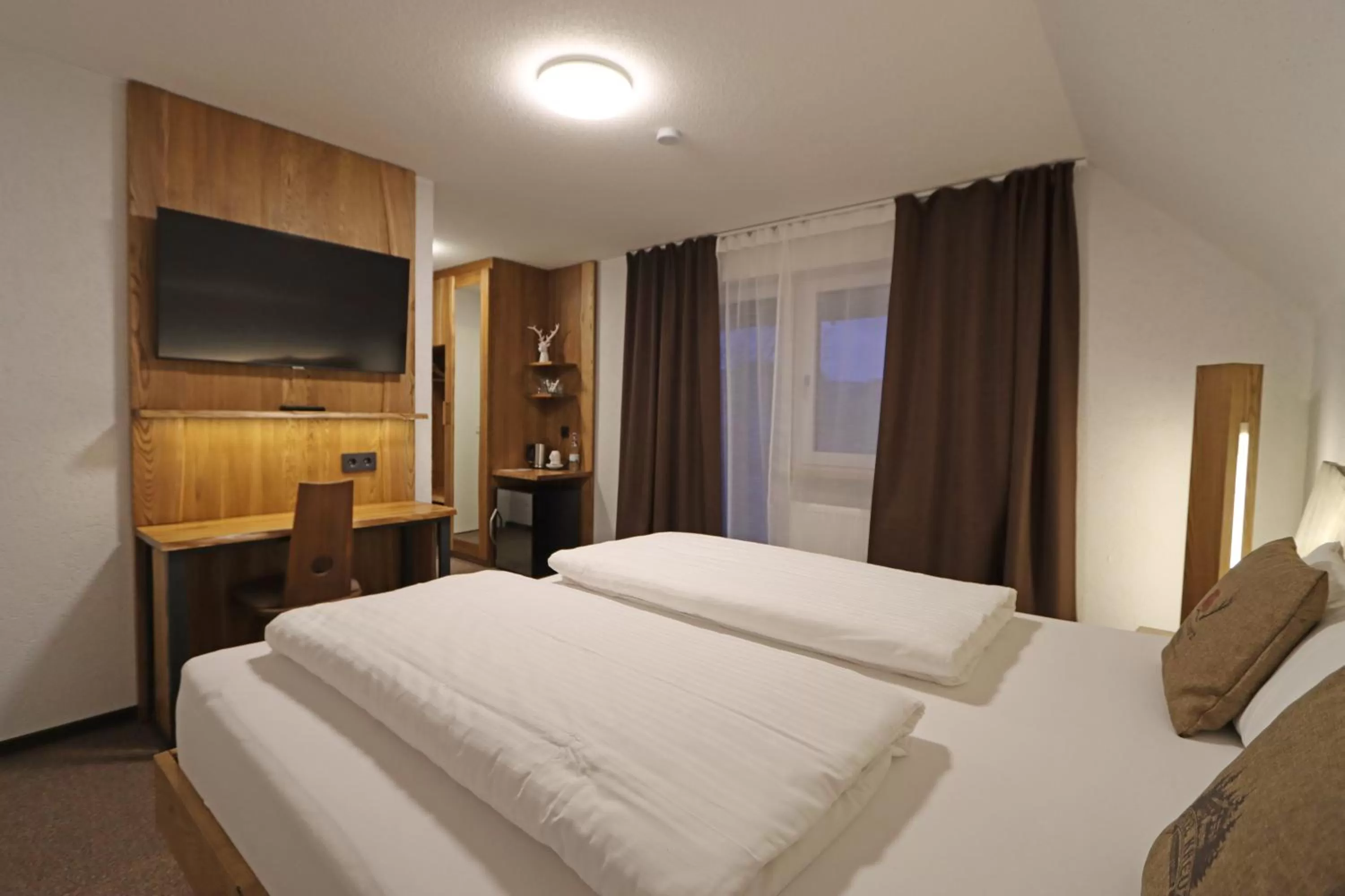 Bed in Hotel Kreuz Höhengasthof