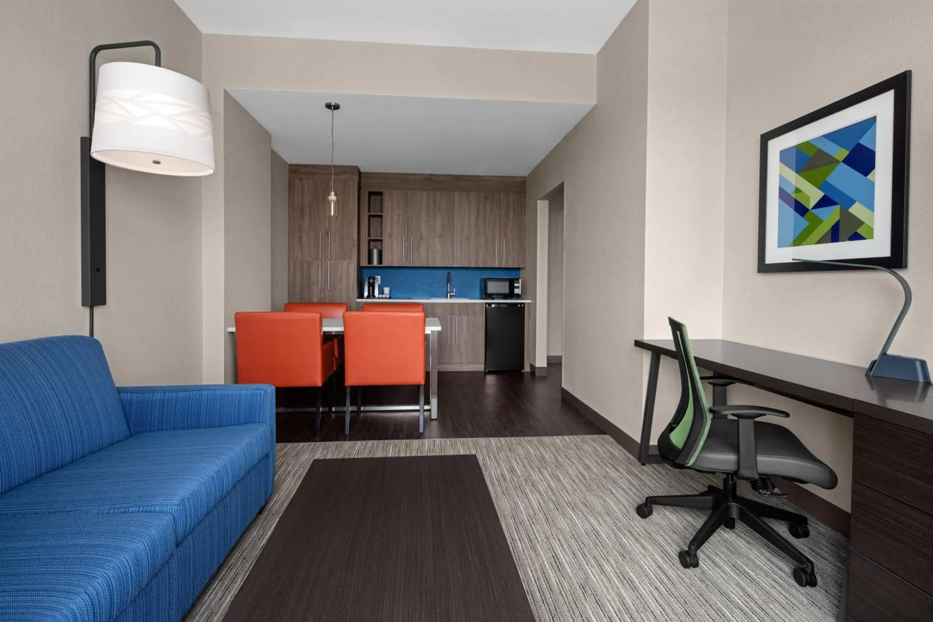 Bedroom, Seating Area in Holiday Inn Express & Suites - Woodside Queens NYC, an IHG Hotel