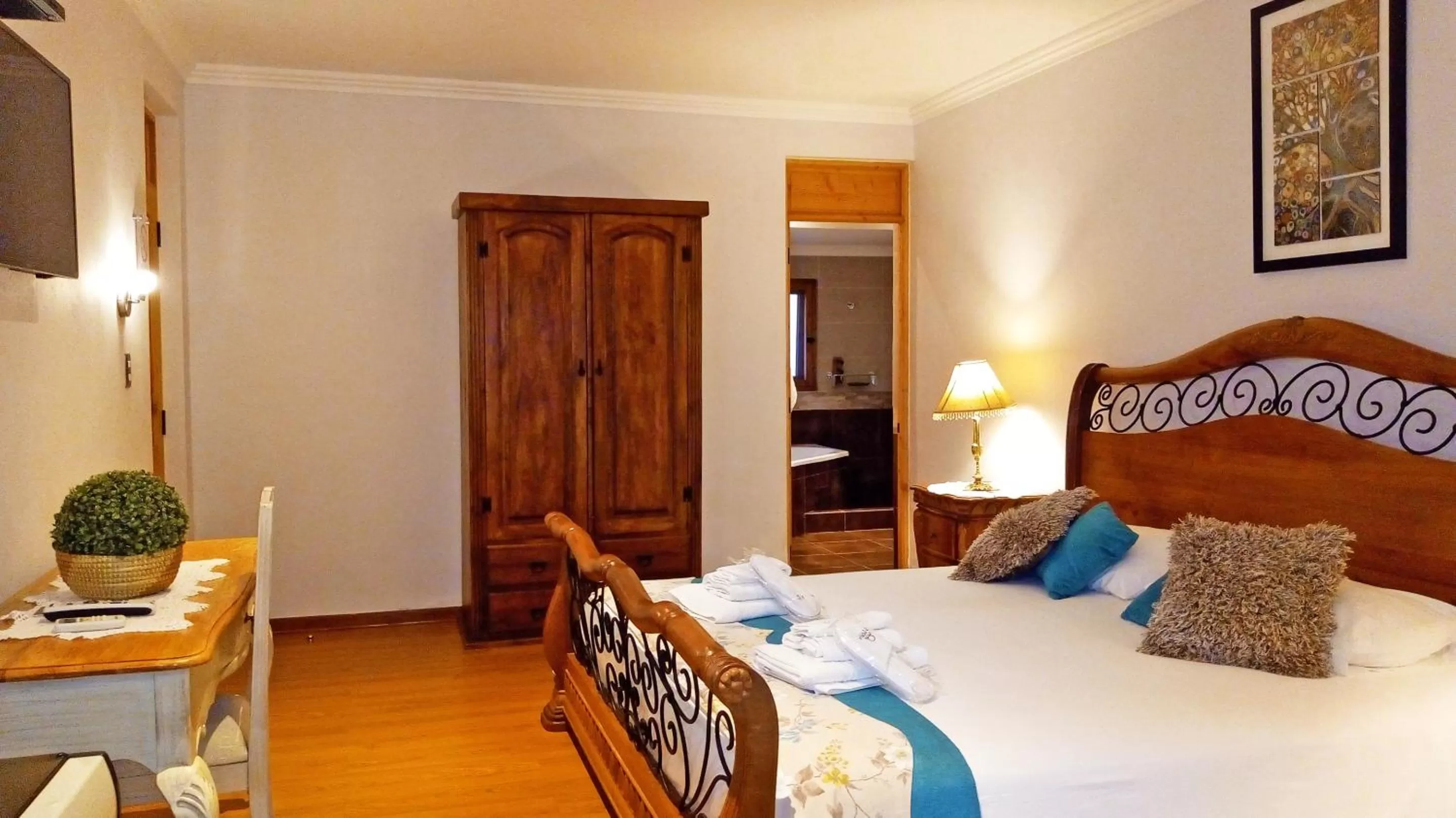 Bed in La Perla Hotel