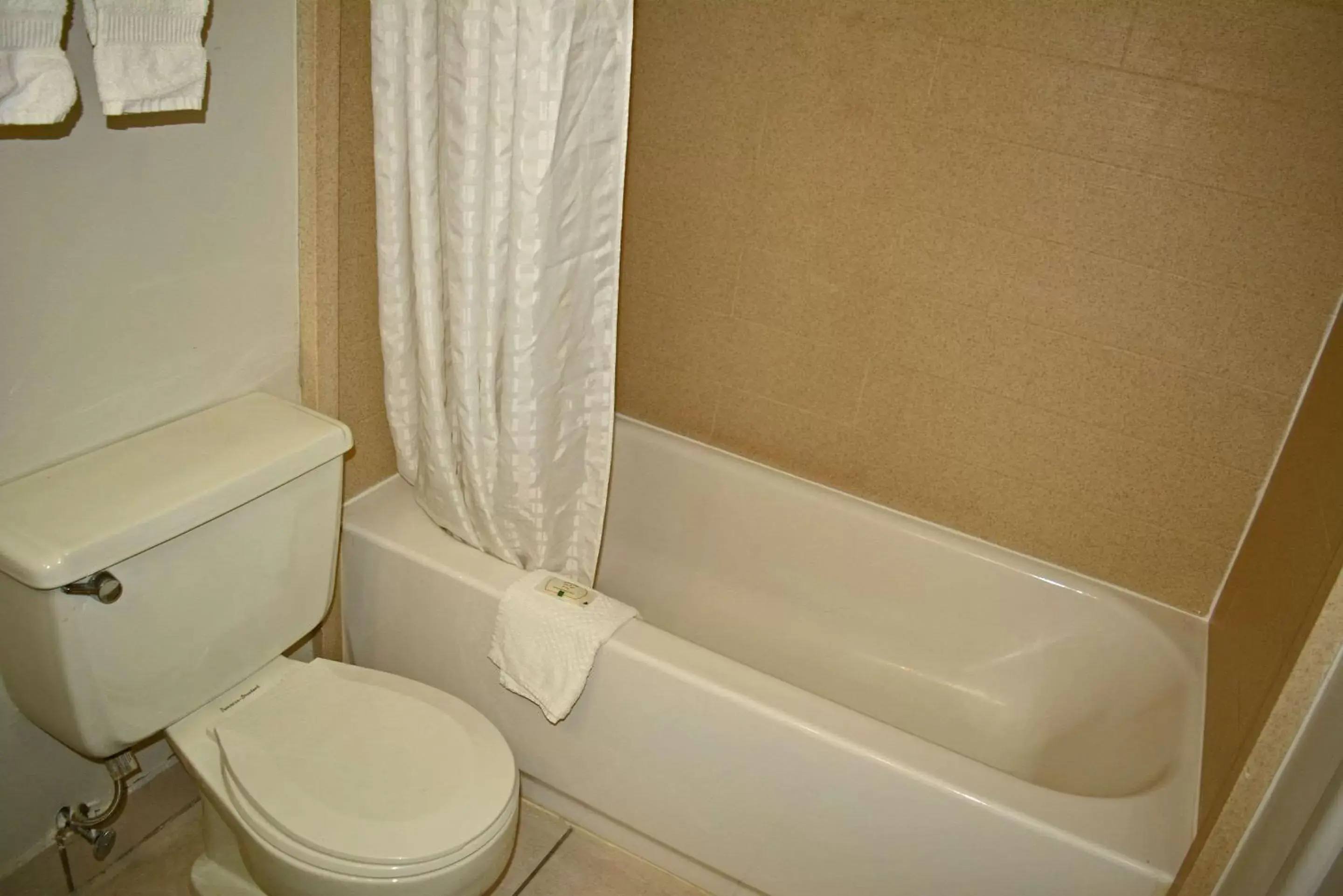 Bedroom in Quality Inn & Suites East Syracuse - Carrier Circle Bedroom in Quality Inn & Suites East Syracuse - Carrier Circle