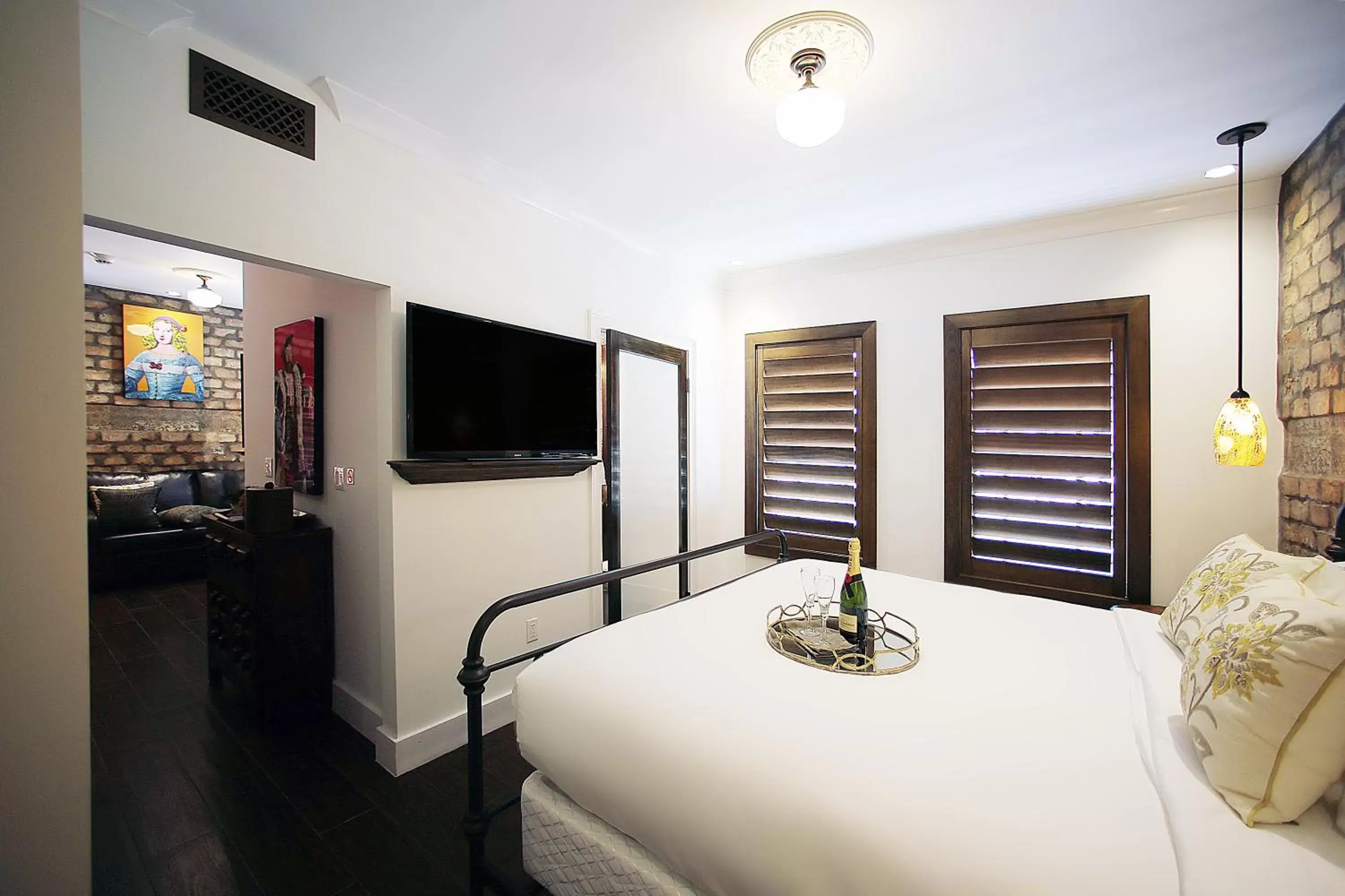 Bed, TV/Entertainment Center in Cavalier South Beach Hotel