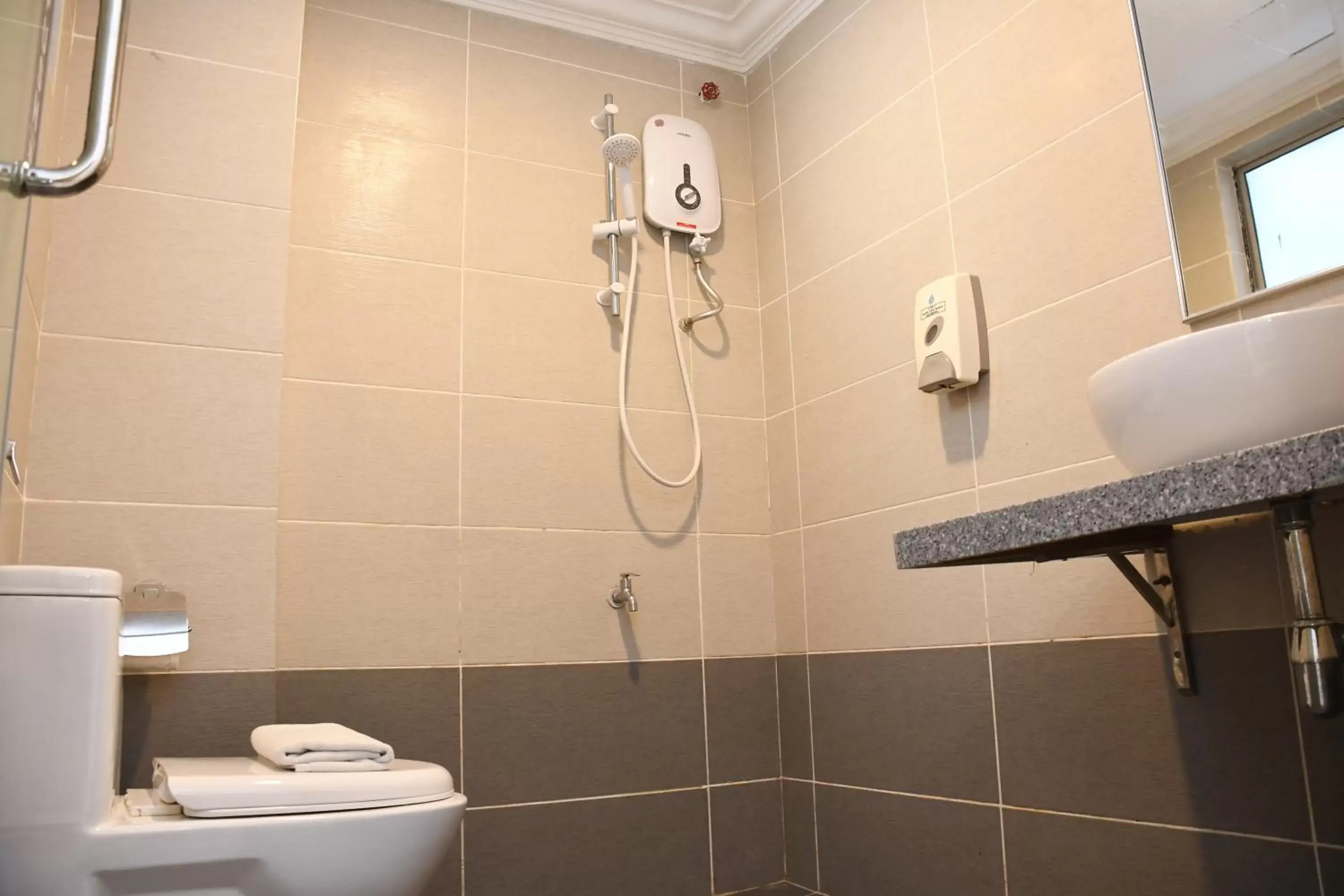 Shower, Bathroom in Promenade Service Apartment