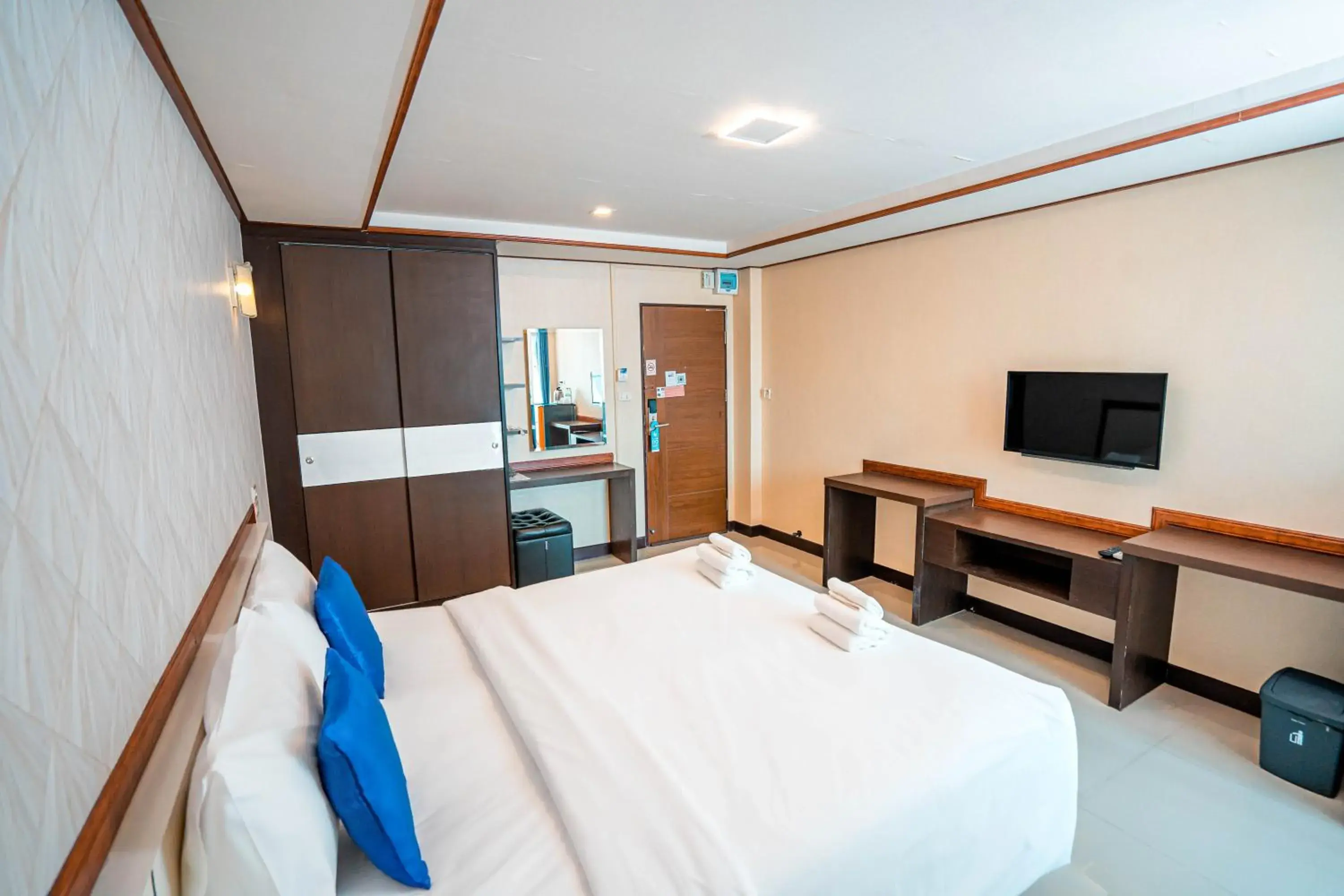 Bedroom, TV/Entertainment Center in Blue Sky Residence Airport