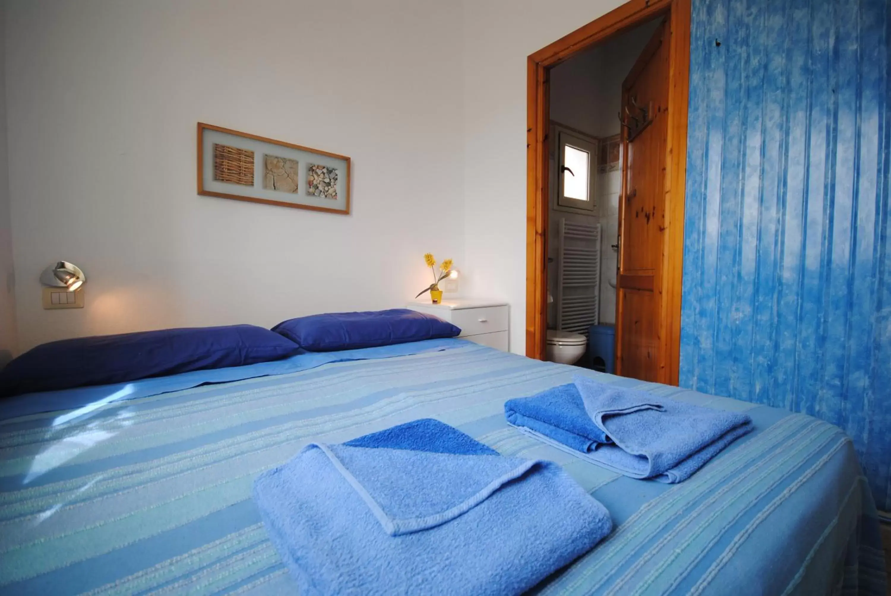 Toilet, Bed in Holiday Residence Rifugio