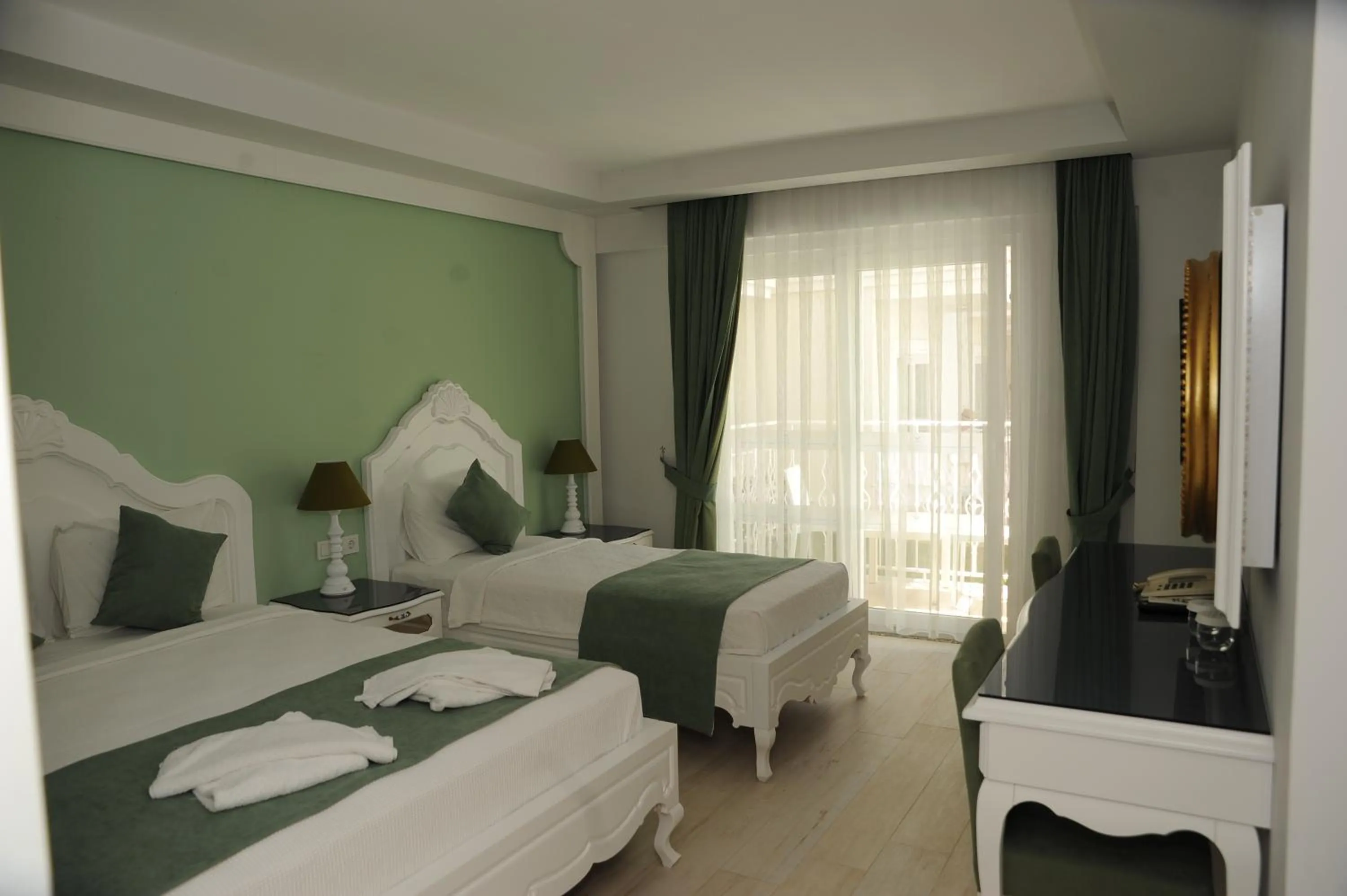 Bed in Montebello Deluxe Hotel