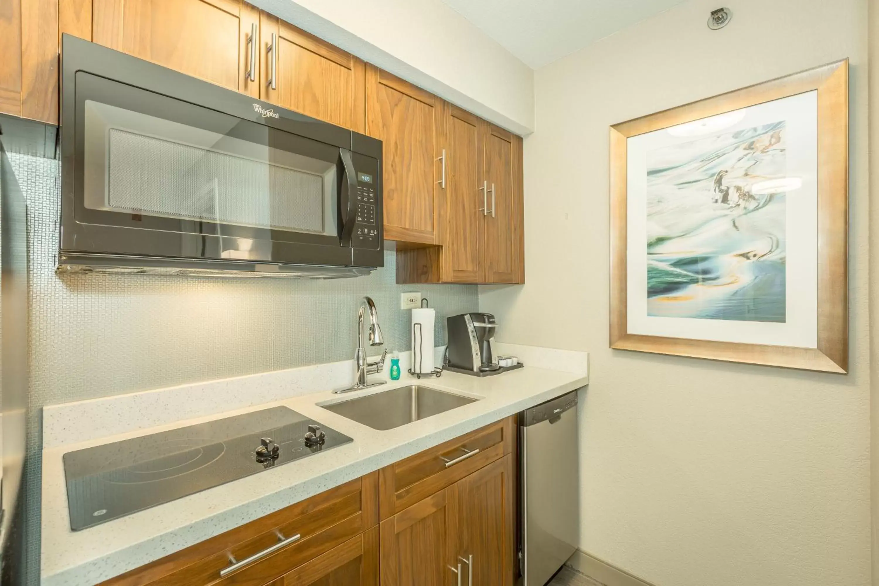 Photo of the whole room, Kitchen/Kitchenette in Holiday Inn Hotel and Suites Peachtree City, an IHG Hotel