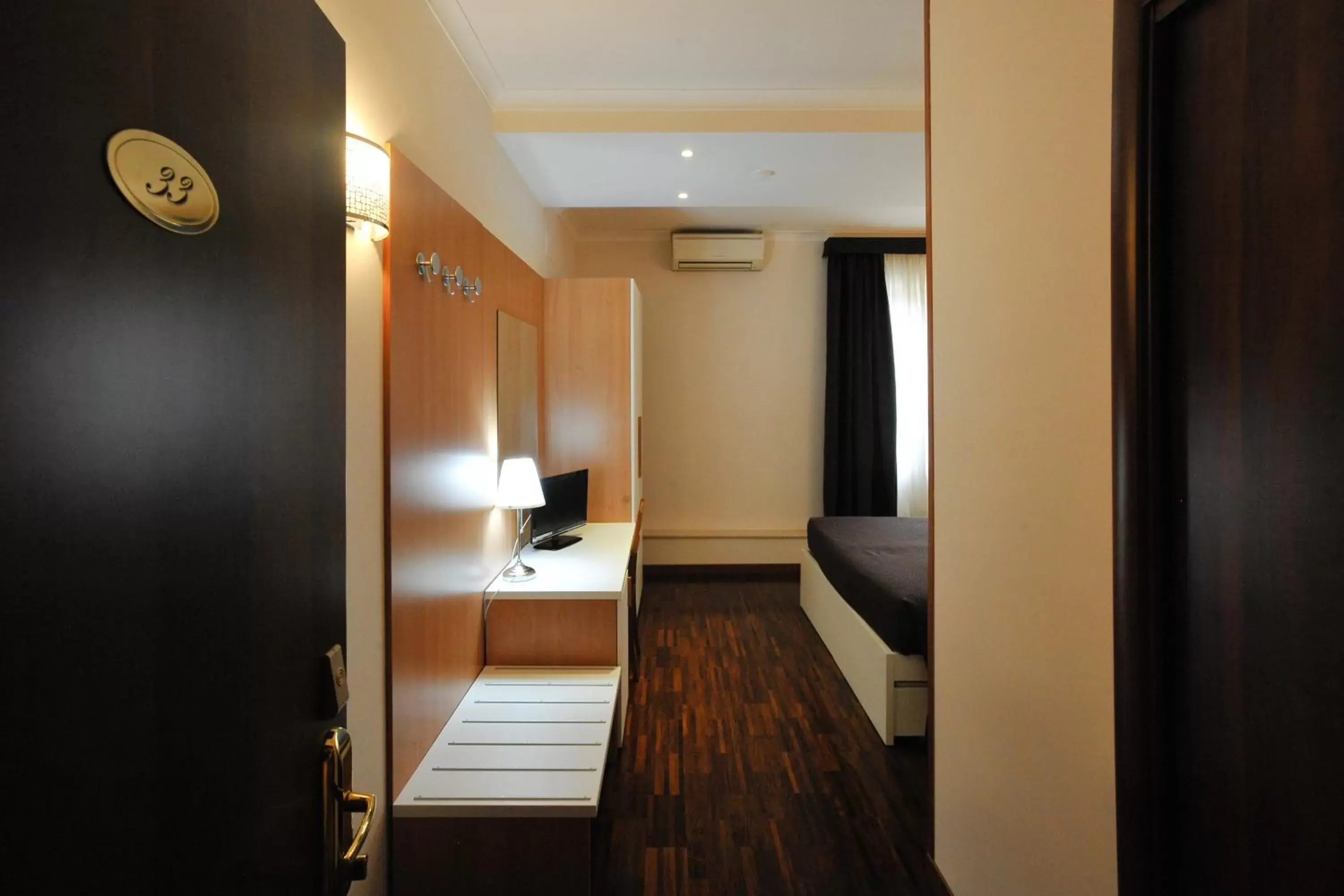 Bedroom in Hotel Roma Tiburtina Metro