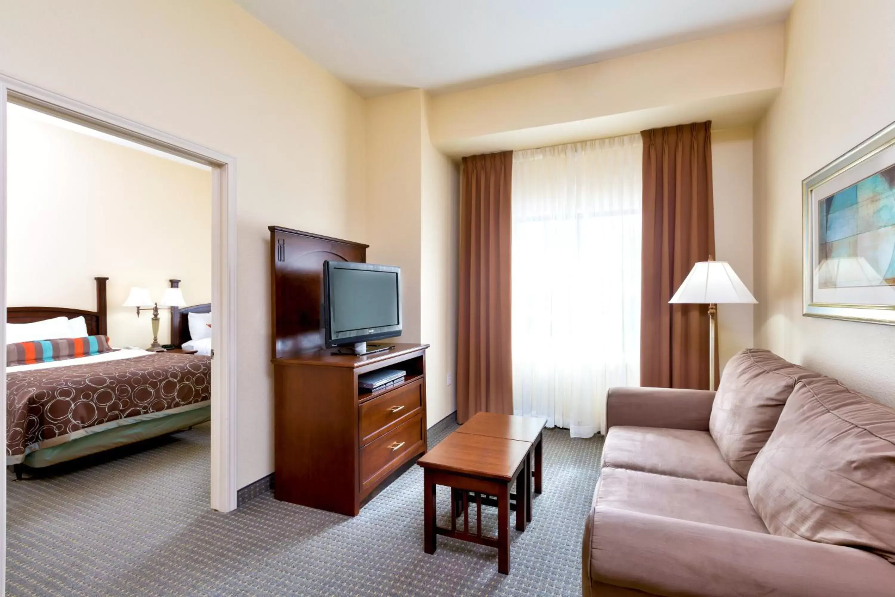 Photo of the whole room, Seating Area in Staybridge Suites McAllen, an IHG Hotel