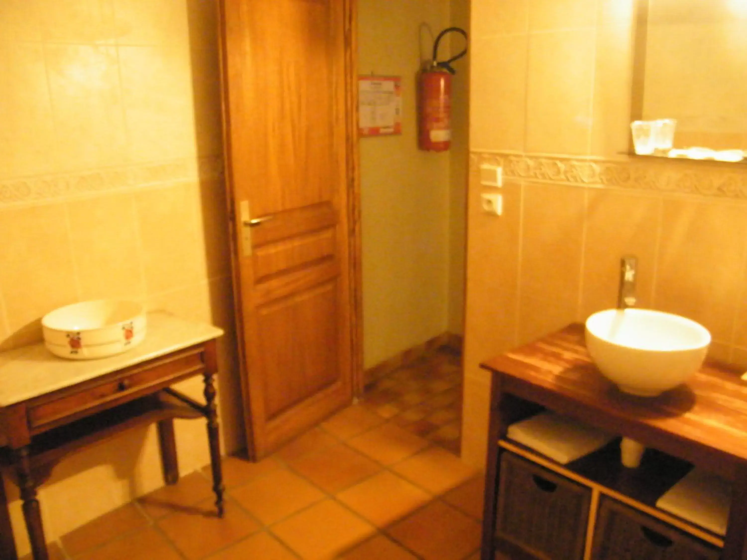 Bathroom in Logis Hotel Restaurant L'Esquielle