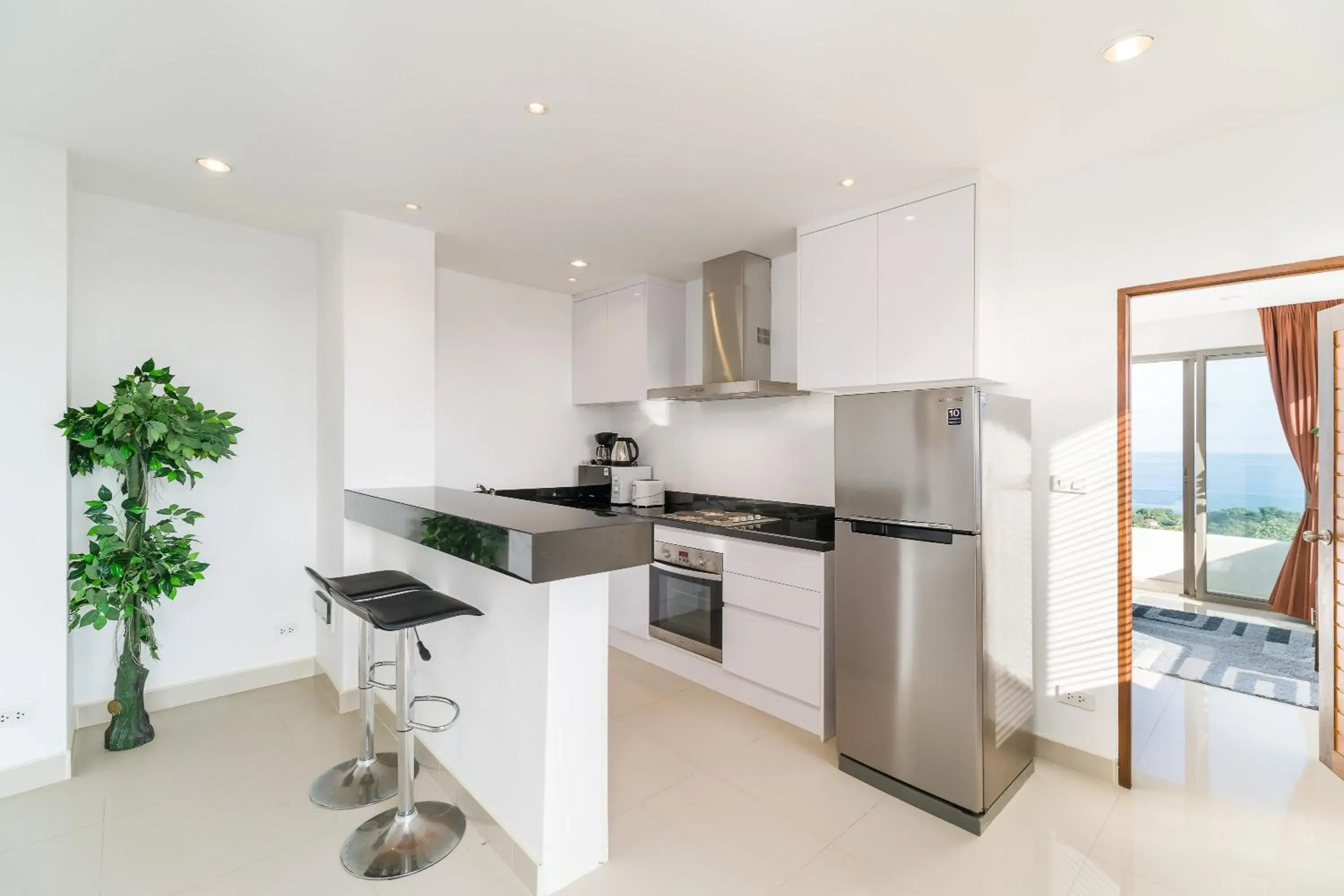 Kitchen/Kitchenette in Tropical Sea View Residence