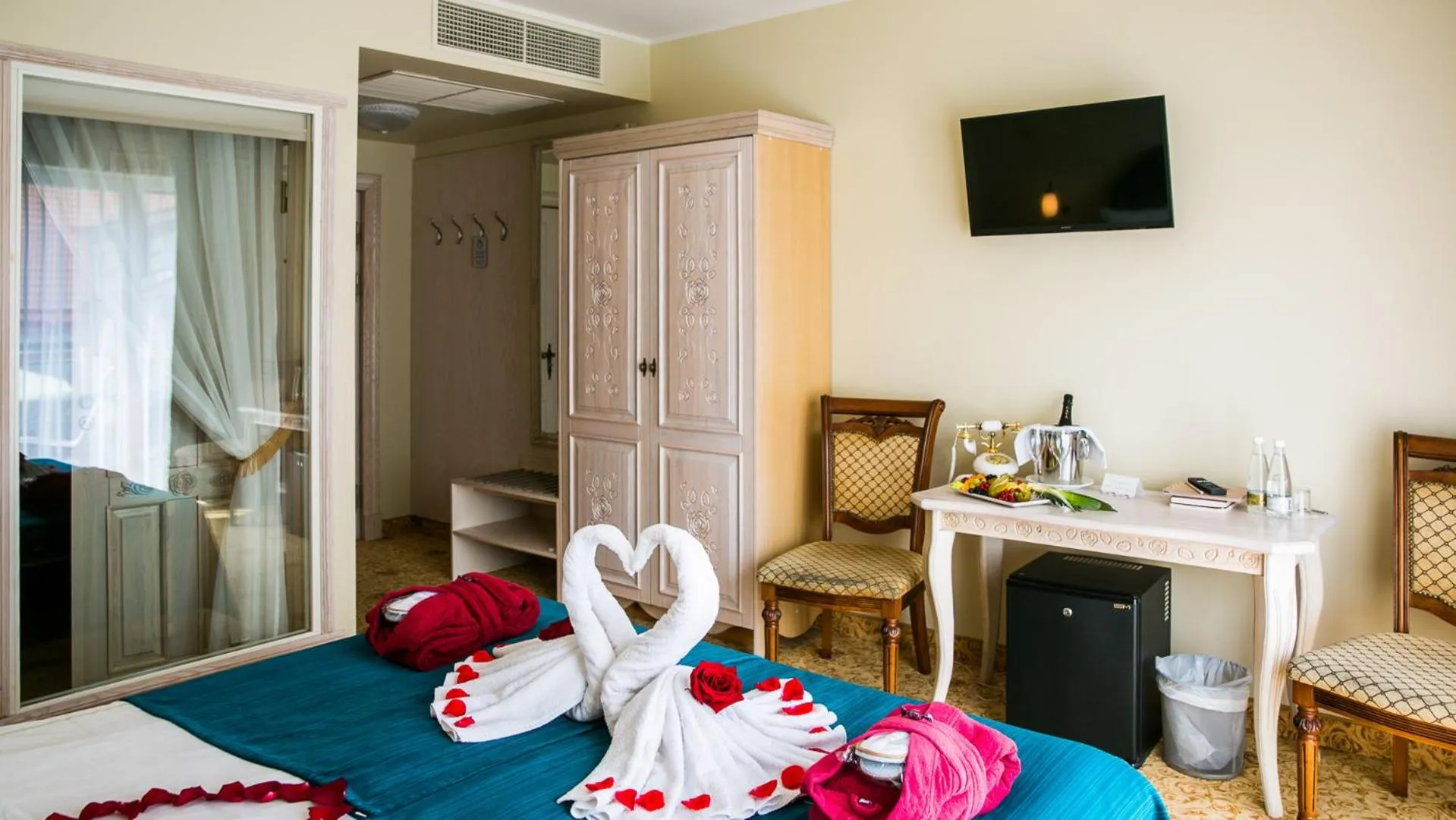 Bed in Grand Rose SPA Hotel