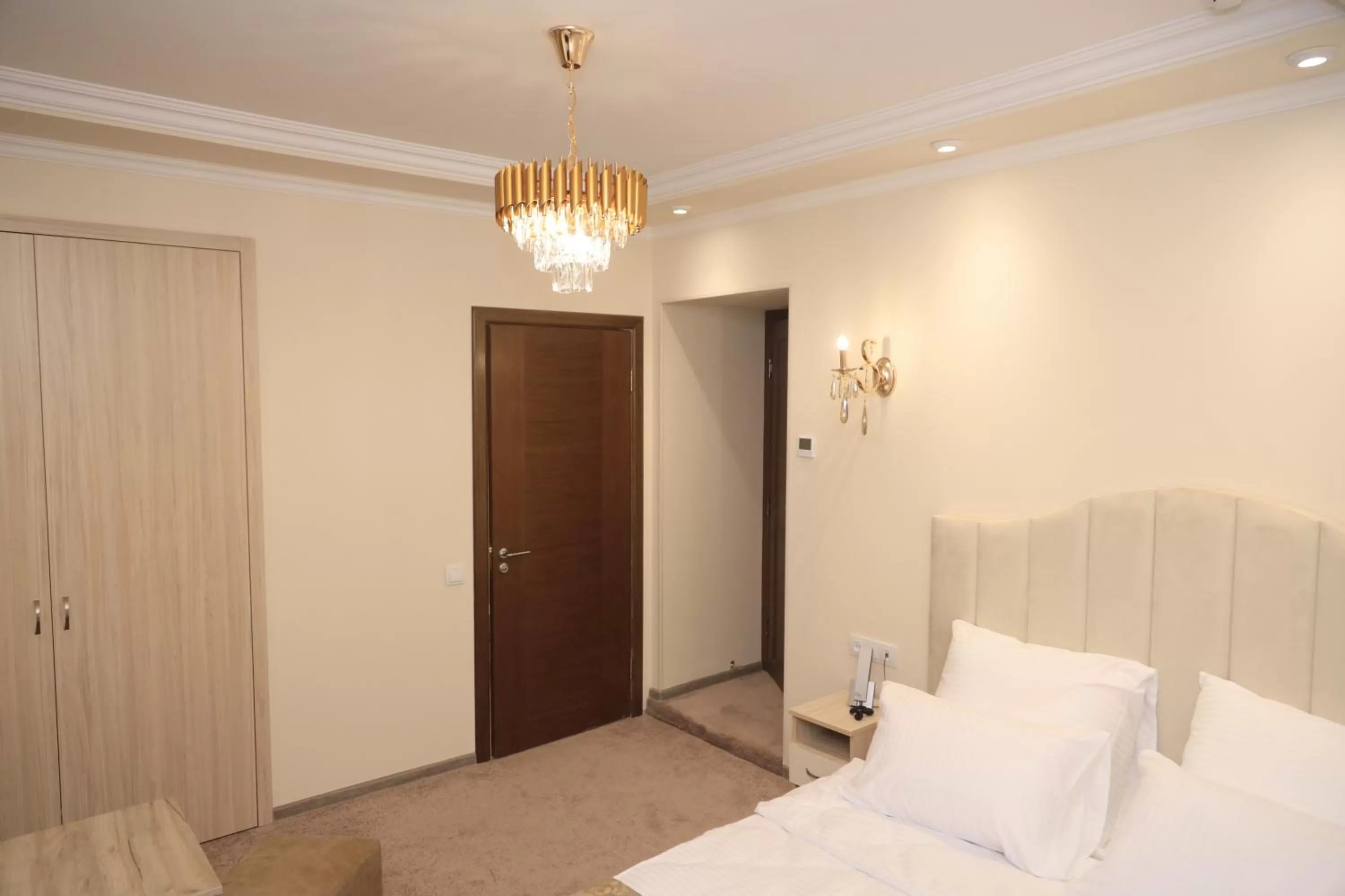 Bed in DeLin Hotel And Tours