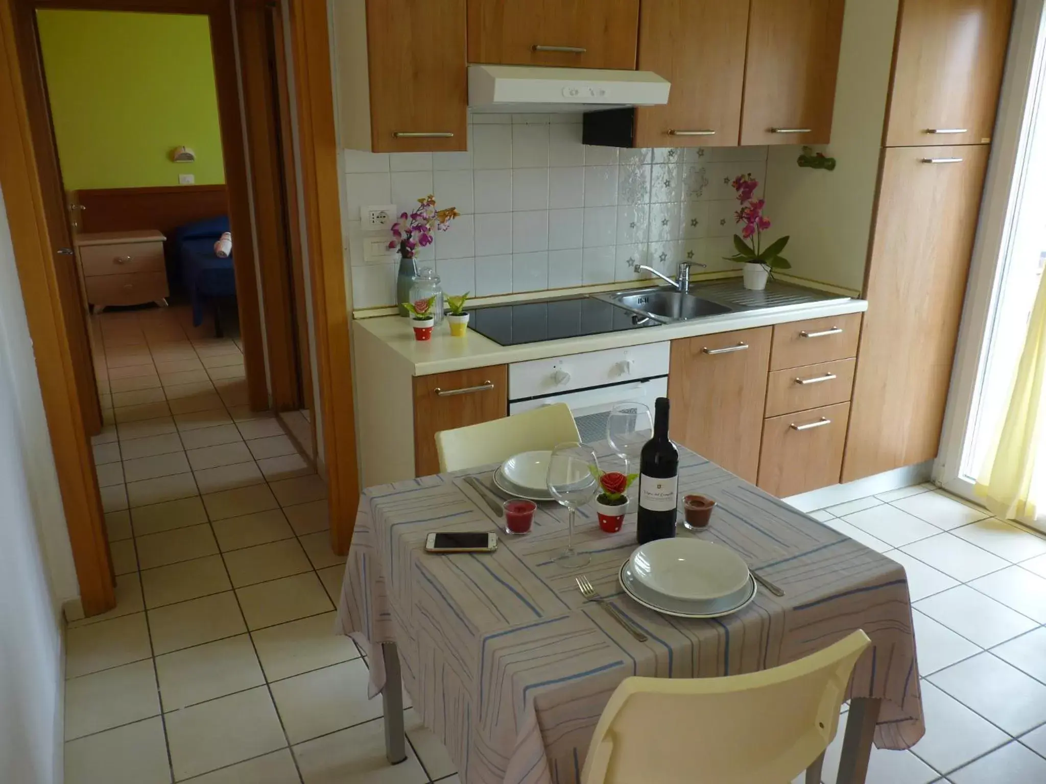 Living room, Kitchen/Kitchenette in Residence Costablu