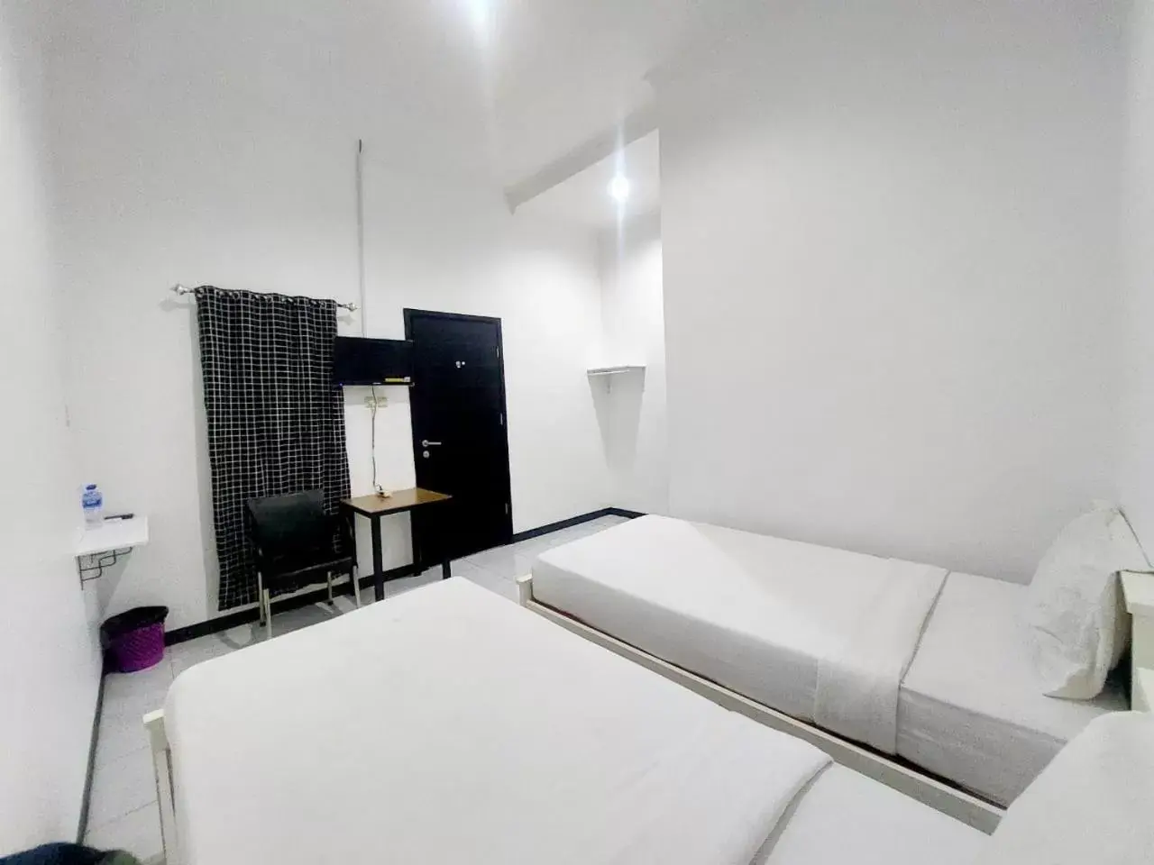 Bed in COZY STAY KUPANG