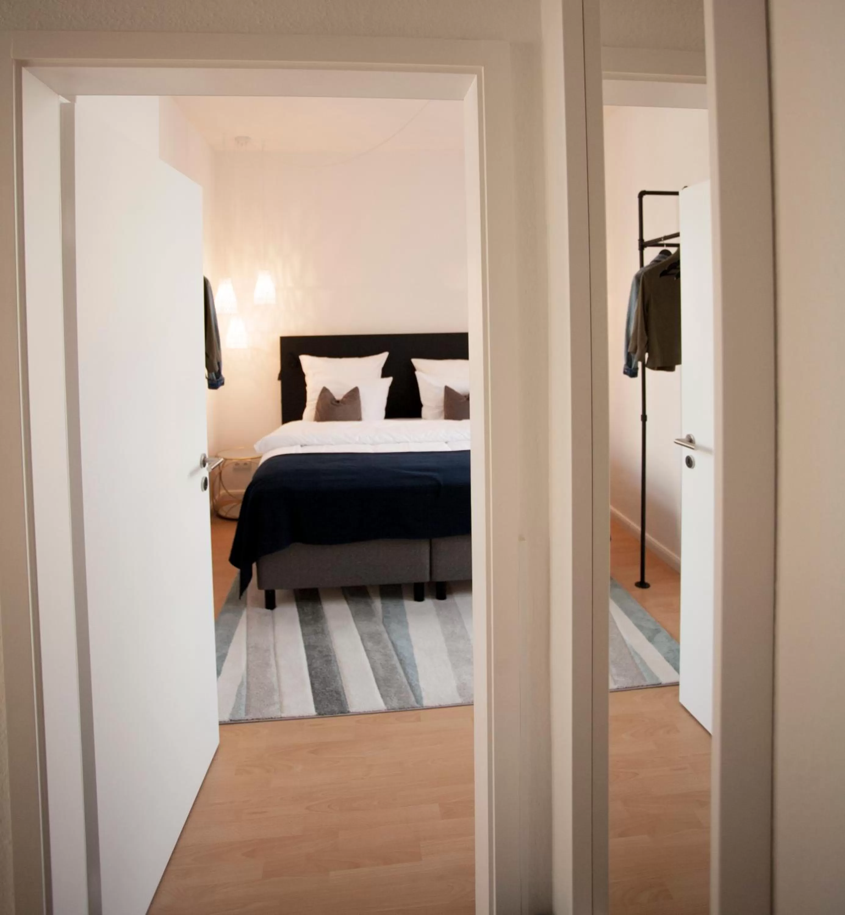 Bed in ONNO Boutique Hotel & Apartments